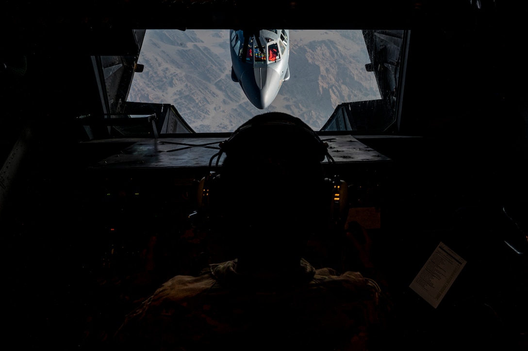 Staff Sgt. Edwin Gomez Rivera, a boom operator assigned to the 908th Expeditionary Air Refuel Squadron, refuels a B-52H Stratofortress, assigned to the 5th Bomb Wing, while conducting a presence patrol mission with regional partner nation air forces within the U.S. Central Command area of responsibility, June 8, 2022. The U.S. and its allies and partners are capable of collective response to instability promoted by adversaries. (U.S. Air Force photo by Staff Sgt. Christian Sullivan)