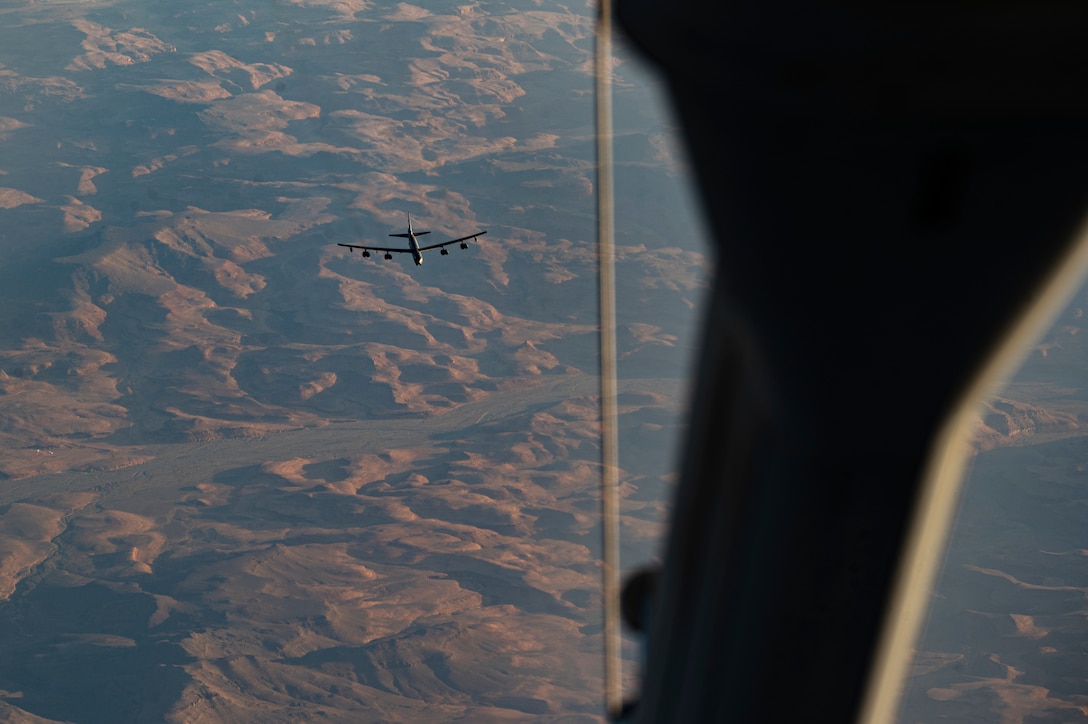 A B-52H Stratofortress, assigned to the 5th Bomb Wing, approaches a KC-10 Extender, assigned to the 908th Expeditionary Air Refuel Squadron, while conducting a presence patrol mission with regional partner nation air forces within the U.S. Central Command area of responsibility, June 8, 2022. The U.S. and its allies and partners are capable of collective response to instability promoted by adversaries. (U.S. Air Force photo by Staff Sgt. Christian Sullivan)