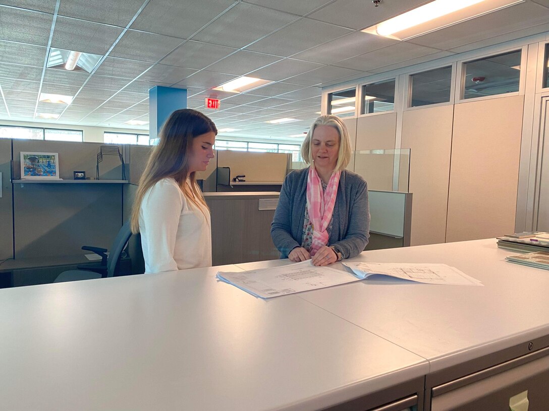 Mary Billings, TAM's chief of Site and Building Design Branch, mentors local John Handley High School student Mikayla Balio as part of her semester with the Middle East District and the Intern Program.