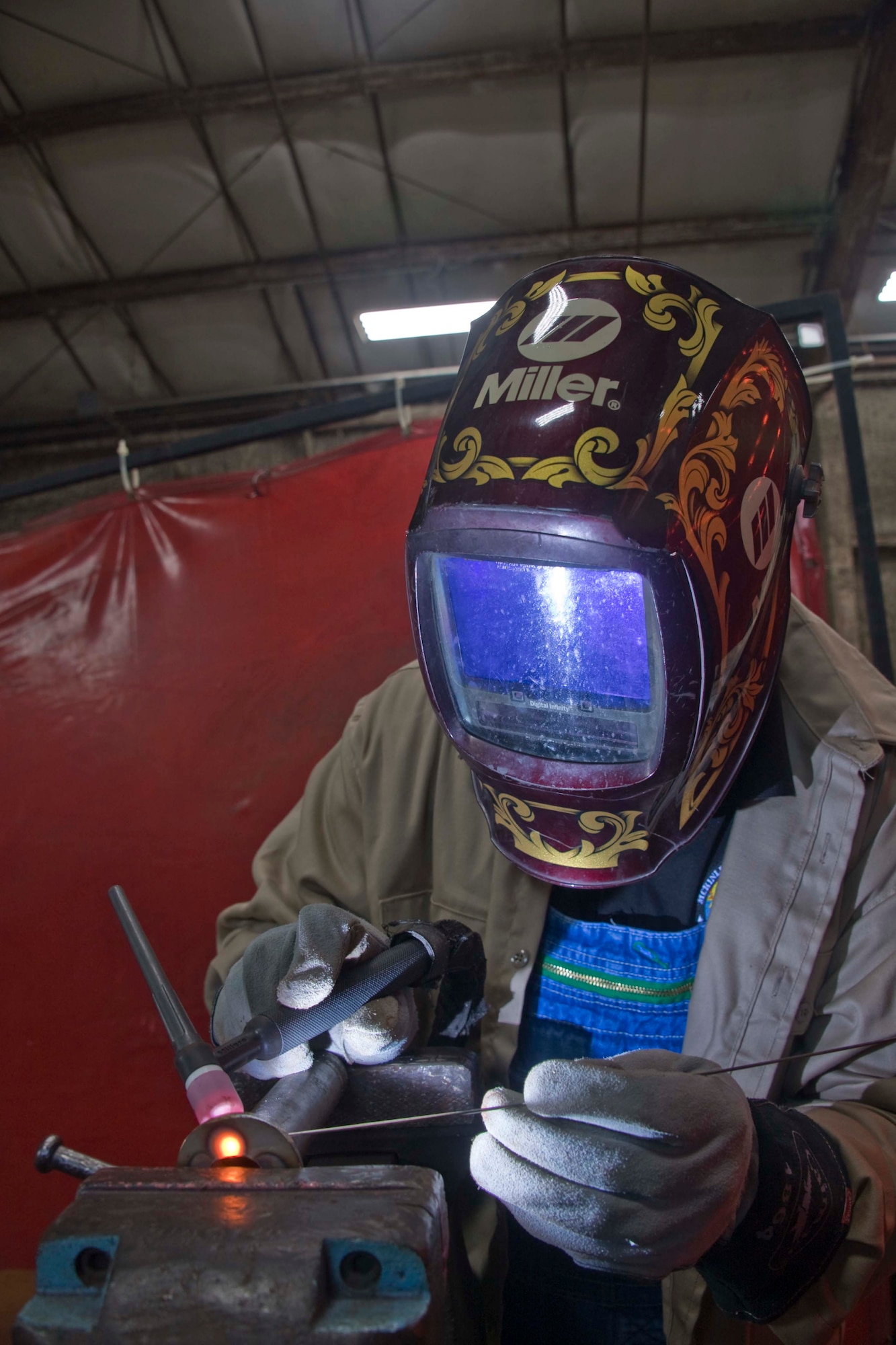 McKinley Climatic Laboratory team member Justin Kolb welds a drop leg for refrigeration units used in the facility at Eglin Air Force Base, Florida, May 17, 2022. Those at the MCL recently celebrated the 75th anniversary of the facility. The first tests at the MCL occurred in May 1947. The MCL is operated by the 717th Test Squadron, 804th Test Group, Arnold Engineering Development Complex. (U.S. Air Force photo by Bruce Hoffman)