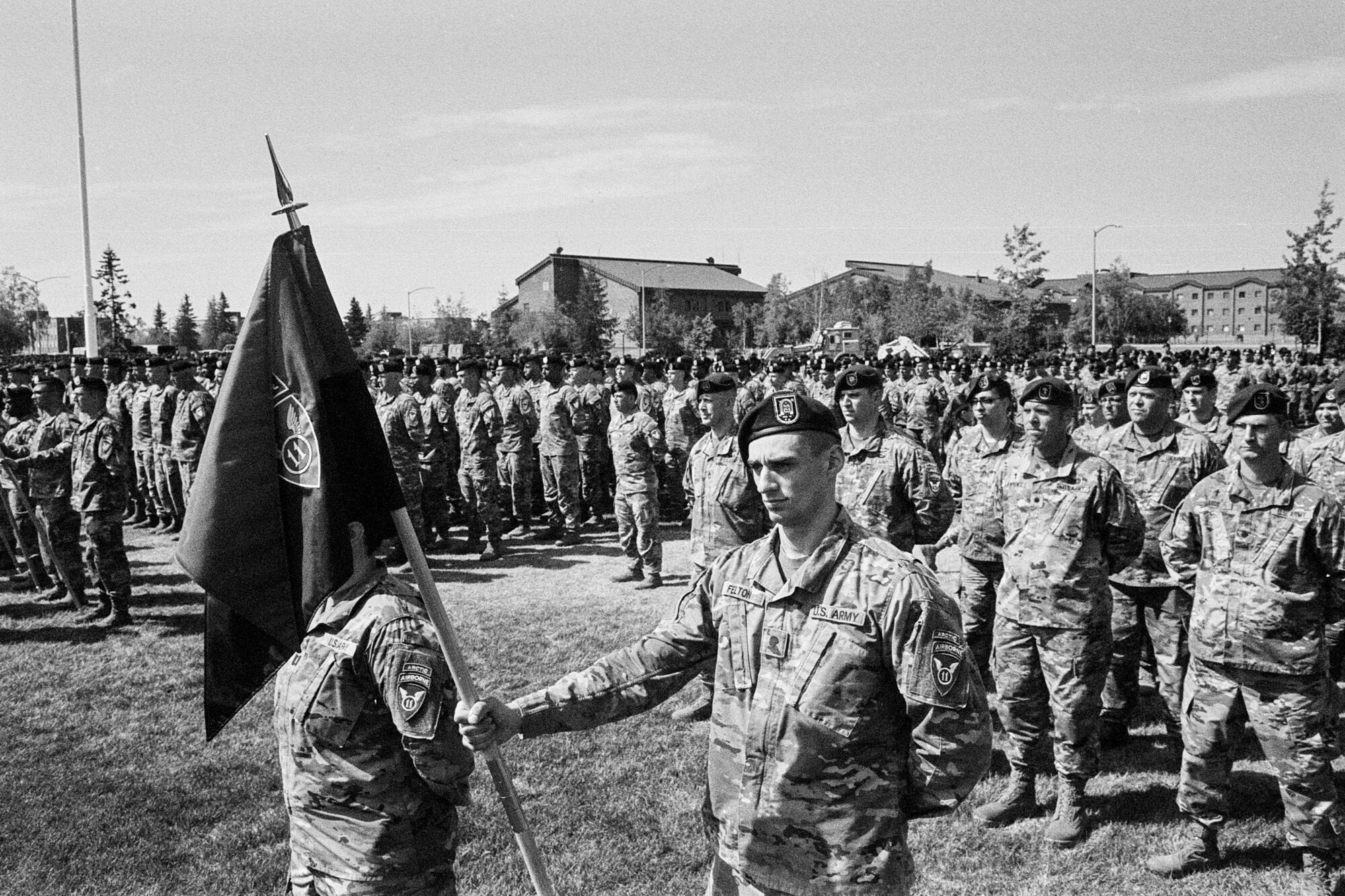 Soldiers stand in formation during a ceremony