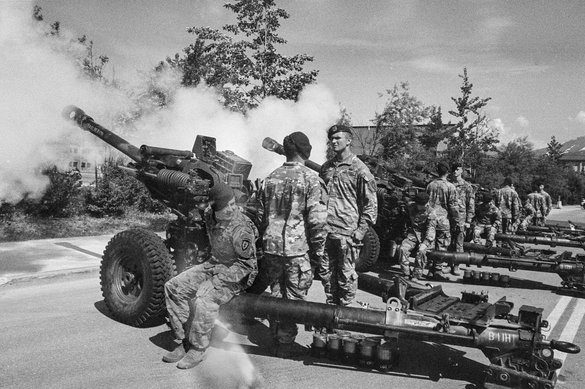 Soldiers perform ceremonial fire of howitzers