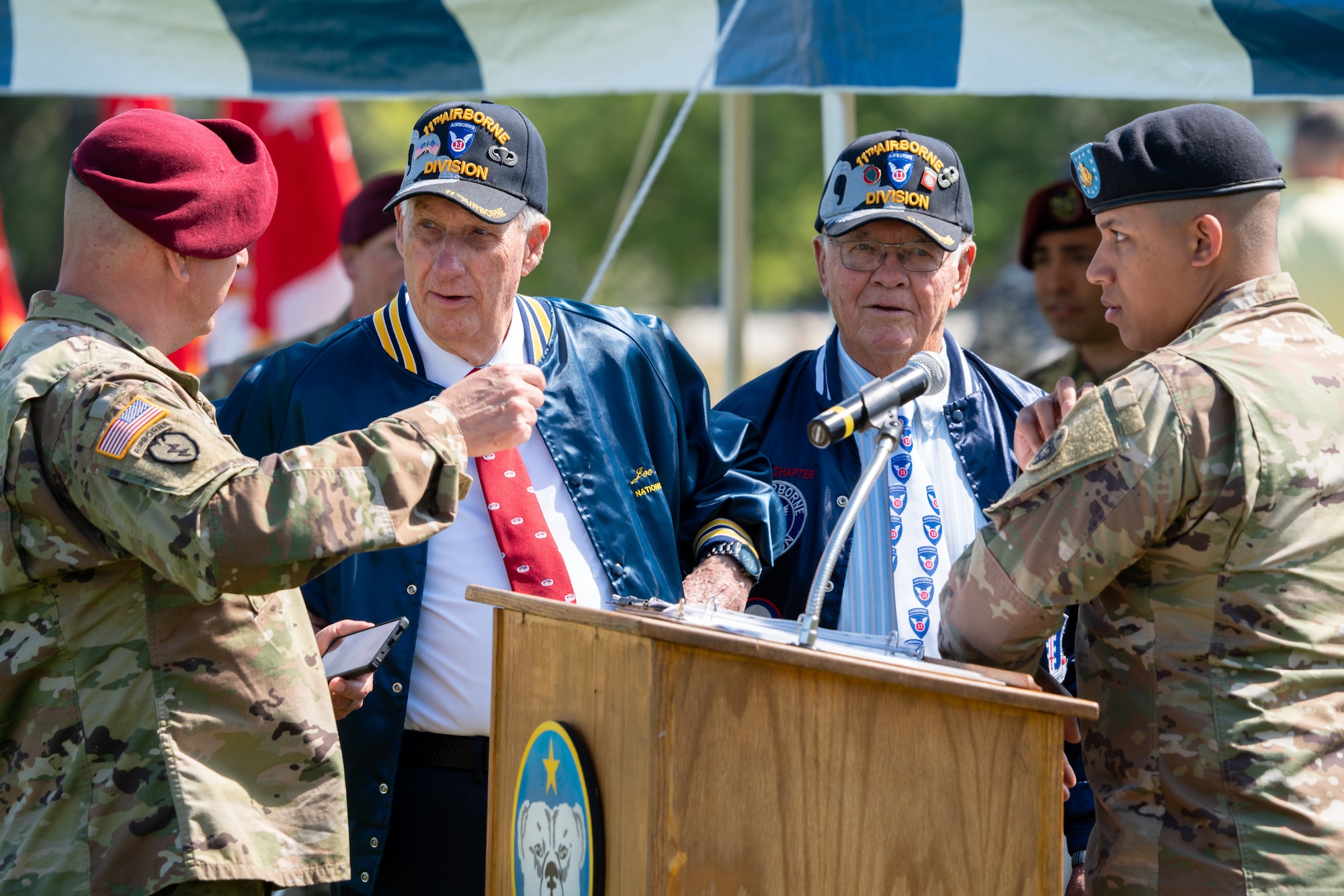U.S. Army veterans speak to Soldiers during a ceremony