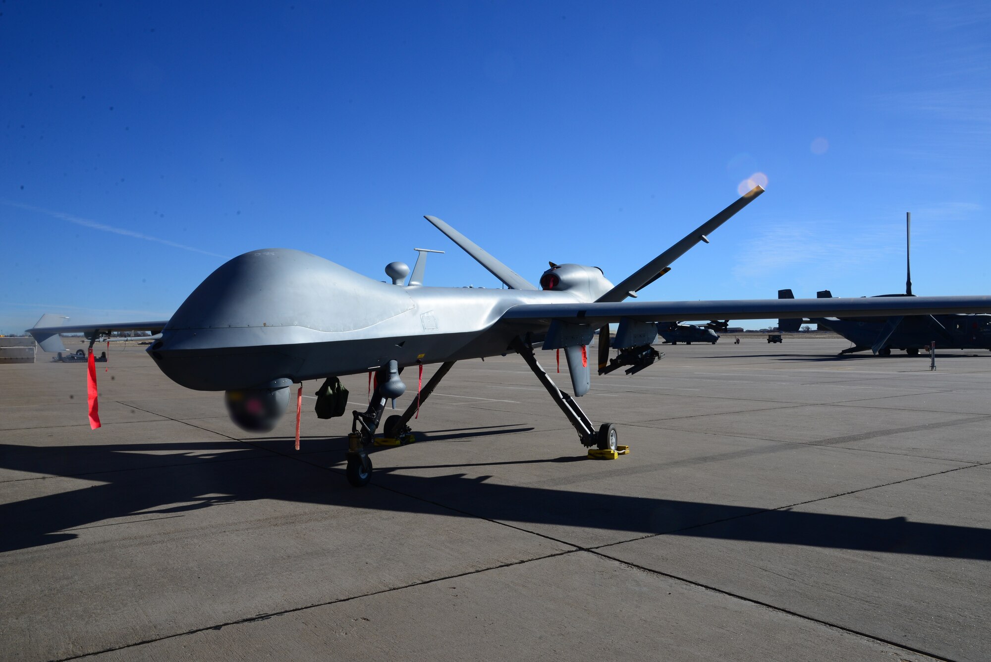 An MQ-9 Reaper with the 27th Special Operations Group undergoes maintenance check at Cannon Air Force Base, New Mexico, Jan. 28, 2019. The Reaper is employed primarily as an intelligence-collection asset and secondarily against dynamic execution targets. Given its significant loiter time, wide-range sensors, multi-mode communications suite, and precision weapons, it provides a unique capability to perform strike, coordination, and reconnaissance against high-value, fleeting, and time-sensitive targets. (U.S. Air Force Photo by Airman 1st Class Vernon R. Walter III)