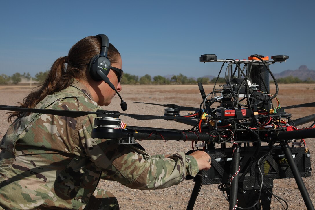 Soldier works on an unmanned aerial vehicle.