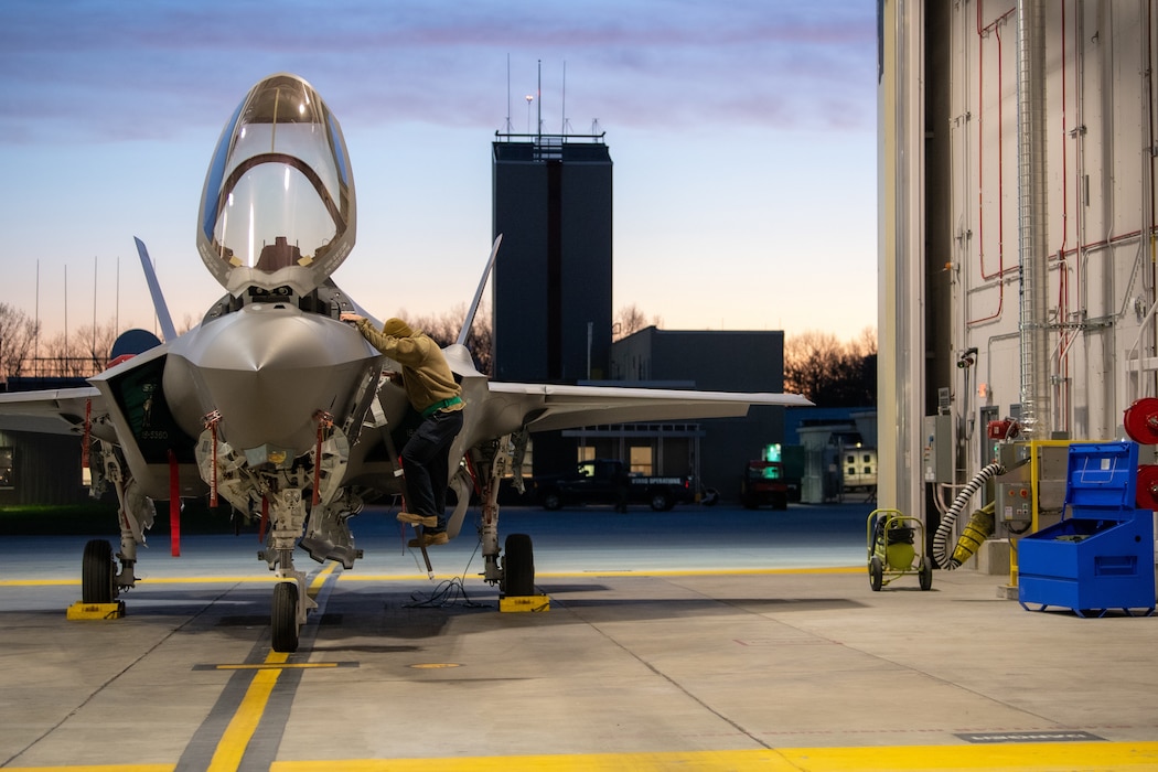 Photo of a crew chief assigned to the 158th Fighter Wing, preps an F-35A Lightning II fifth generation aircraft assigned to the wing at the Vermont Air National Guard Base.