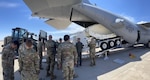 Airmen from the 138th Space Electromagnetic Warfare Squadron, 233rd Space Group, Colorado Air National Guard load an antenna onto a Lockheed C-130 Hercules during an exercise at Peterson Space Force Base, Colorado Springs, Colorado, May 15, 2022. The 138th SPCS mission is to provide global space electronic attack capabilities to rapidly achieve flexible and versatile electronic warfare effects in support of global and theater campaigns. (U.S. Air National Guard photo by Staff Sgt. Barb Cuellar)