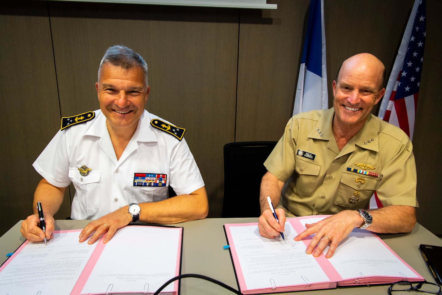 Vice Adm. Bill Merz and French navy Rear Adm. Christophe Lucas attend the U.S.- France Strategic Dialogue in Paris.