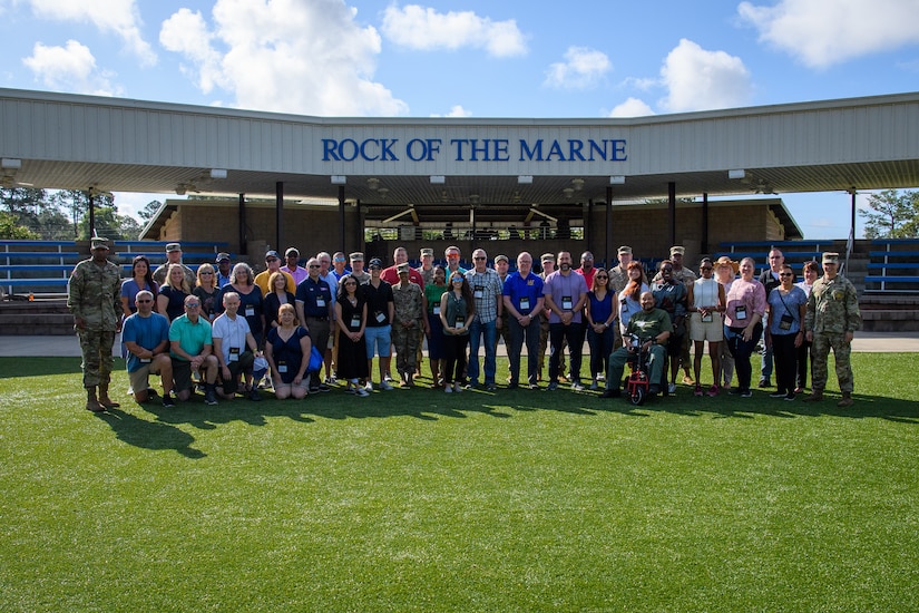 Educators and Soldiers pose for a photo