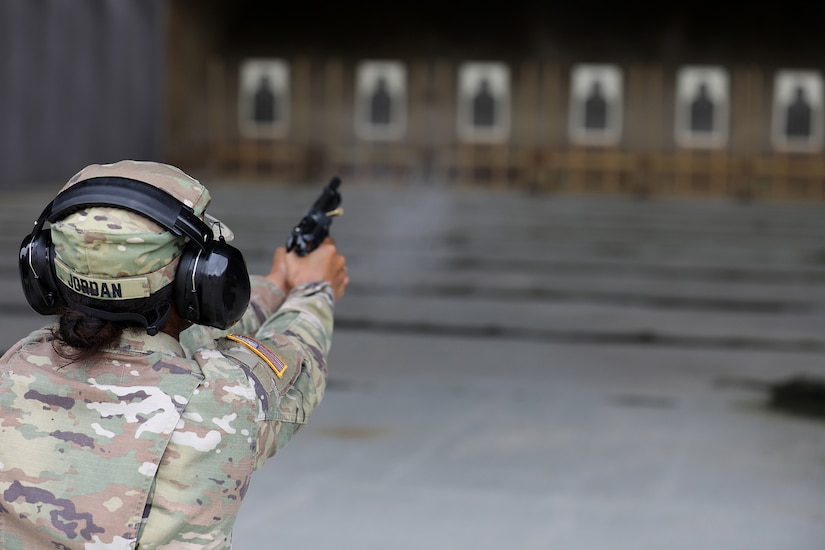 Maj. Joan Jordan, Deputy Command Judge Advocate, 85th U.S. Army Reserve Support Command, fires an M-9 Beretta pistol during an individual weapons qualification at the Joliet Training Area, June 8, 2022.