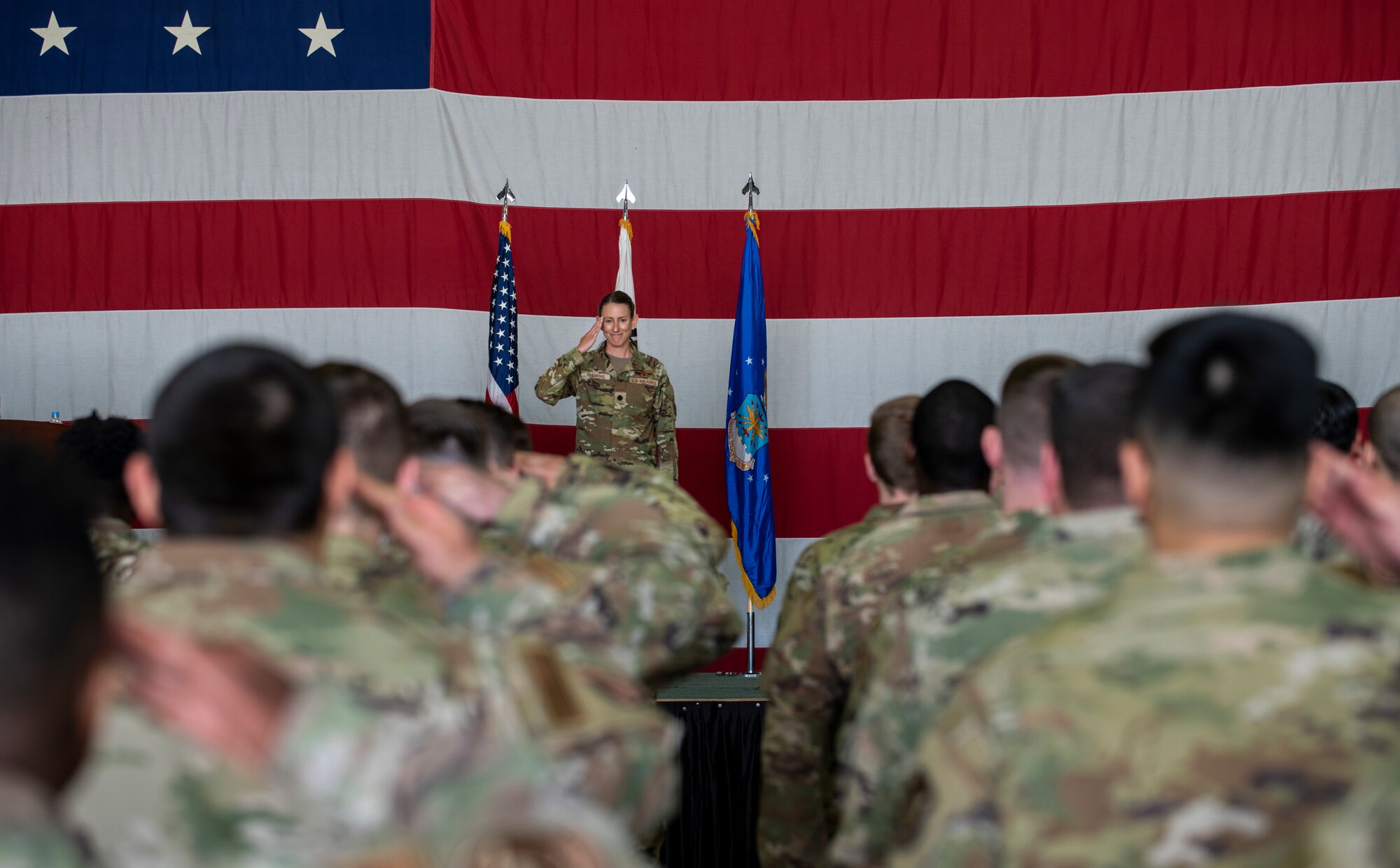 Lt. Col. Chandra Fleming, 51st Operations Support Squadron newly-appointed commander, renders her first salute as the 51st OSS commander to her squadron at Osan Air Base, Republic of Korea, June 7, 2022.