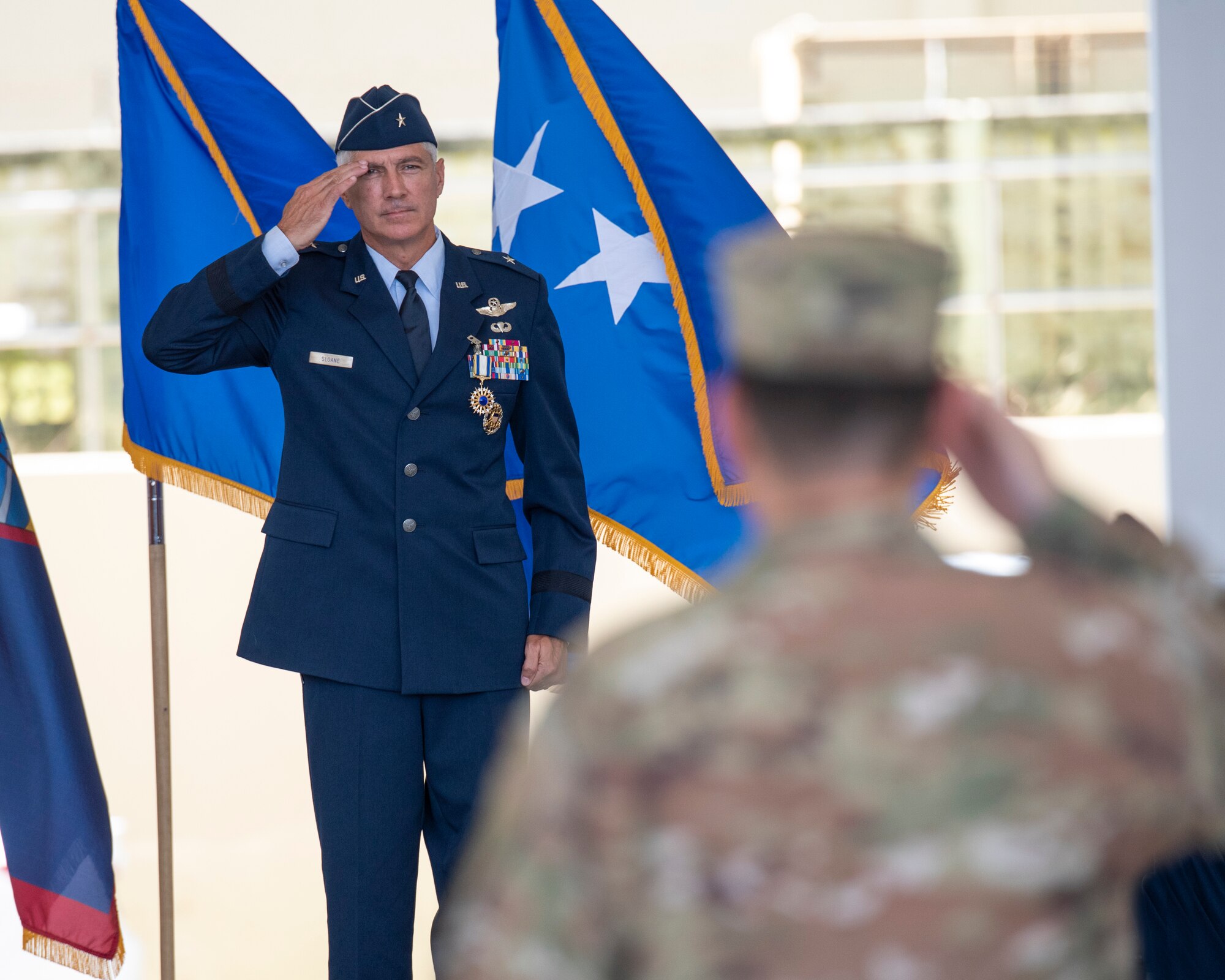 U.S. Air Force Brig. Gen. Jeremy T. Sloane renders his final salute during the 36th Wing change of command ceremony, June 10, 2022, at Andersen Air Force Base, Guam. As installation commander, Birch is now responsible for the well-being of more than 8,000 joint military and civilian personnel on Andersen AFB. Additionally, he supports Department of Defense installation management of Guam and the Northern Mariana Islands as the Deputy Commander of Joint Region Marianas. (U.S. Air Force photo by Staff Sgt. Ryan Brooks)