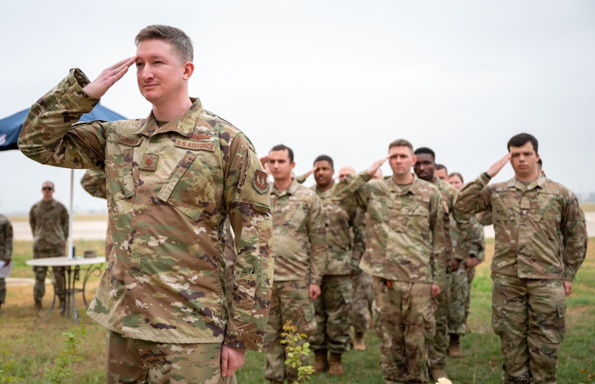 Airmen assigned to the 39th Operations Support Squadron render their first salute to the incoming commander during a change of command ceremony at Incirlik Air Base, Turkey, June 3, 2022. During the ceremony, Lt. Col. Christopher Dieter relinquished command to Col. Douglas Whitehead, 39th Weapons Systems Security Group commander, who then charged Lt. Col. Octavio Prieto with leading the 39th OSS. The change of command ceremony is a long-standing military tradition that represents the formal transfer of command from one officer to another.  (U.S. Air Force photo by Staff Sgt. Gabrielle Winn)