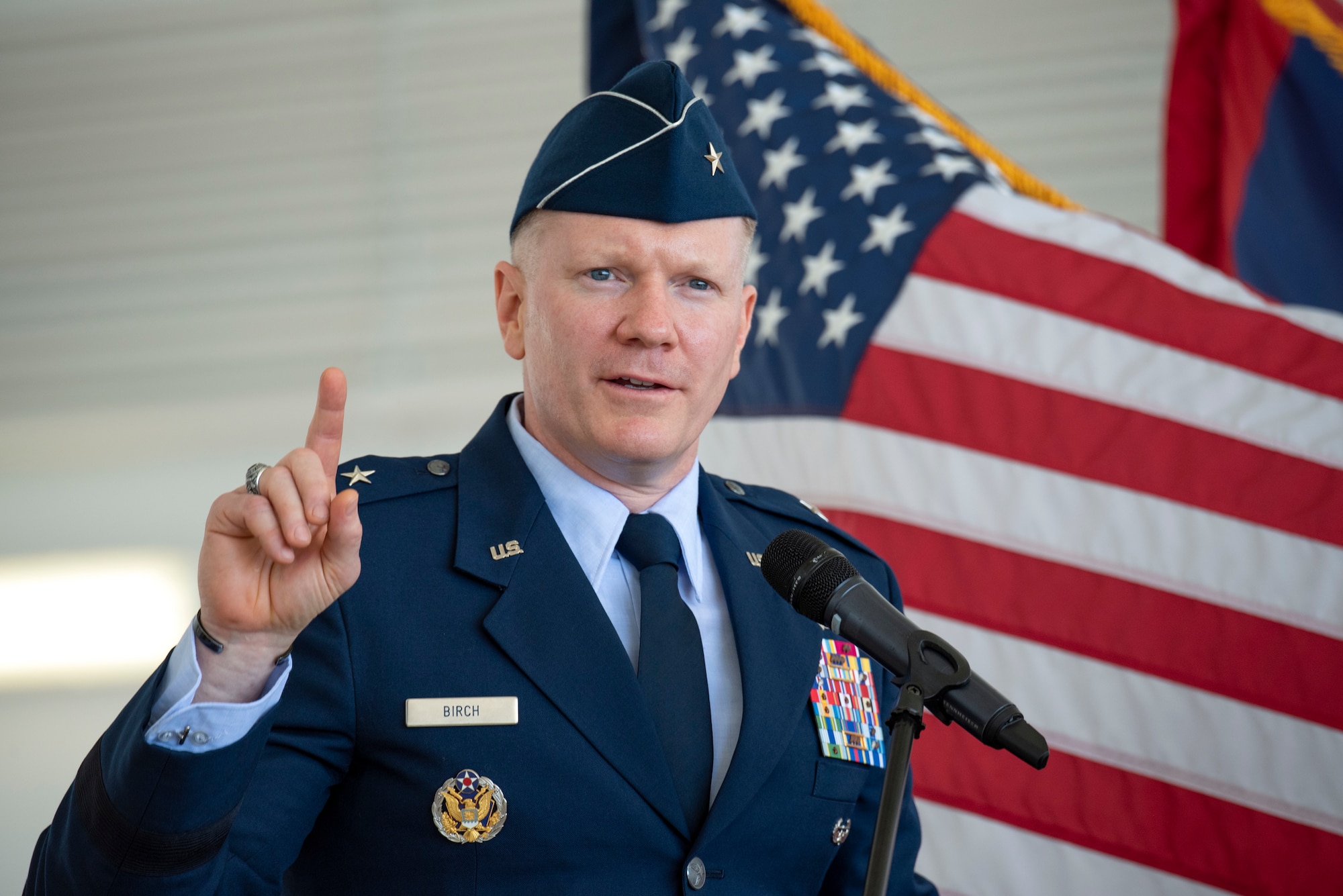 U.S. Air Force Brig. Gen. Paul R. Birch offers remarks during the 36th Wing change of command ceremony, June 10, 2022, at Andersen Air Force Base, Guam. As installation commander, Birch is now responsible for the well-being of more than 8,000 joint military and civilian personnel on Andersen AFB. Additionally, he supports Department of Defense installation management of Guam and the Northern Mariana Islands as the Deputy Commander of Joint Region Marianas. (U.S. Air Force photo by Staff Sgt. Ryan Brooks)