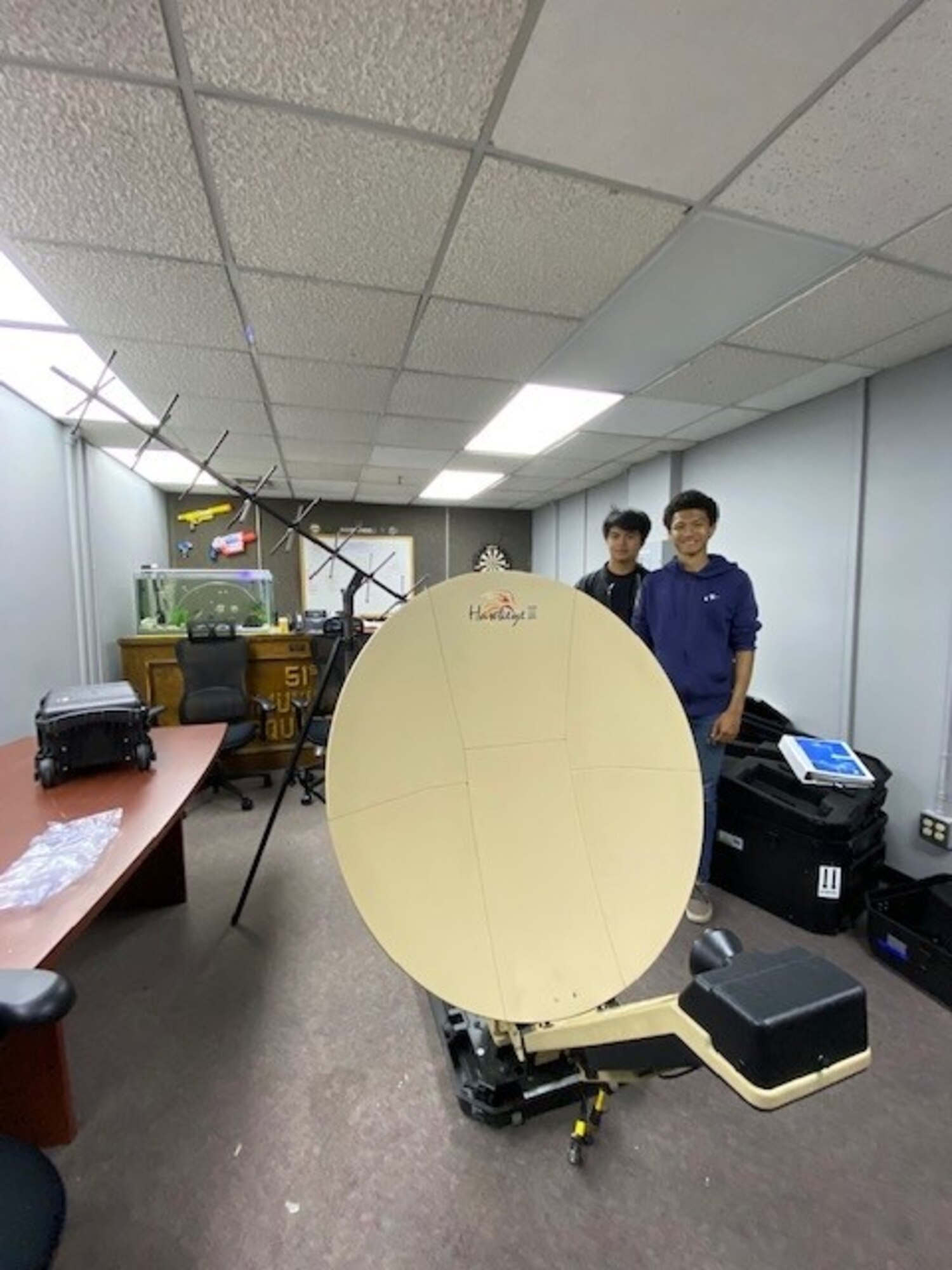 Students from Osan Middle High School finish assembling a mobile radar unit as part of their internship with the 51st Communications Squadron at Osan Air Base