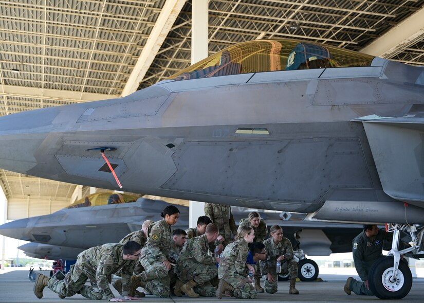 Cadets looking at a jet