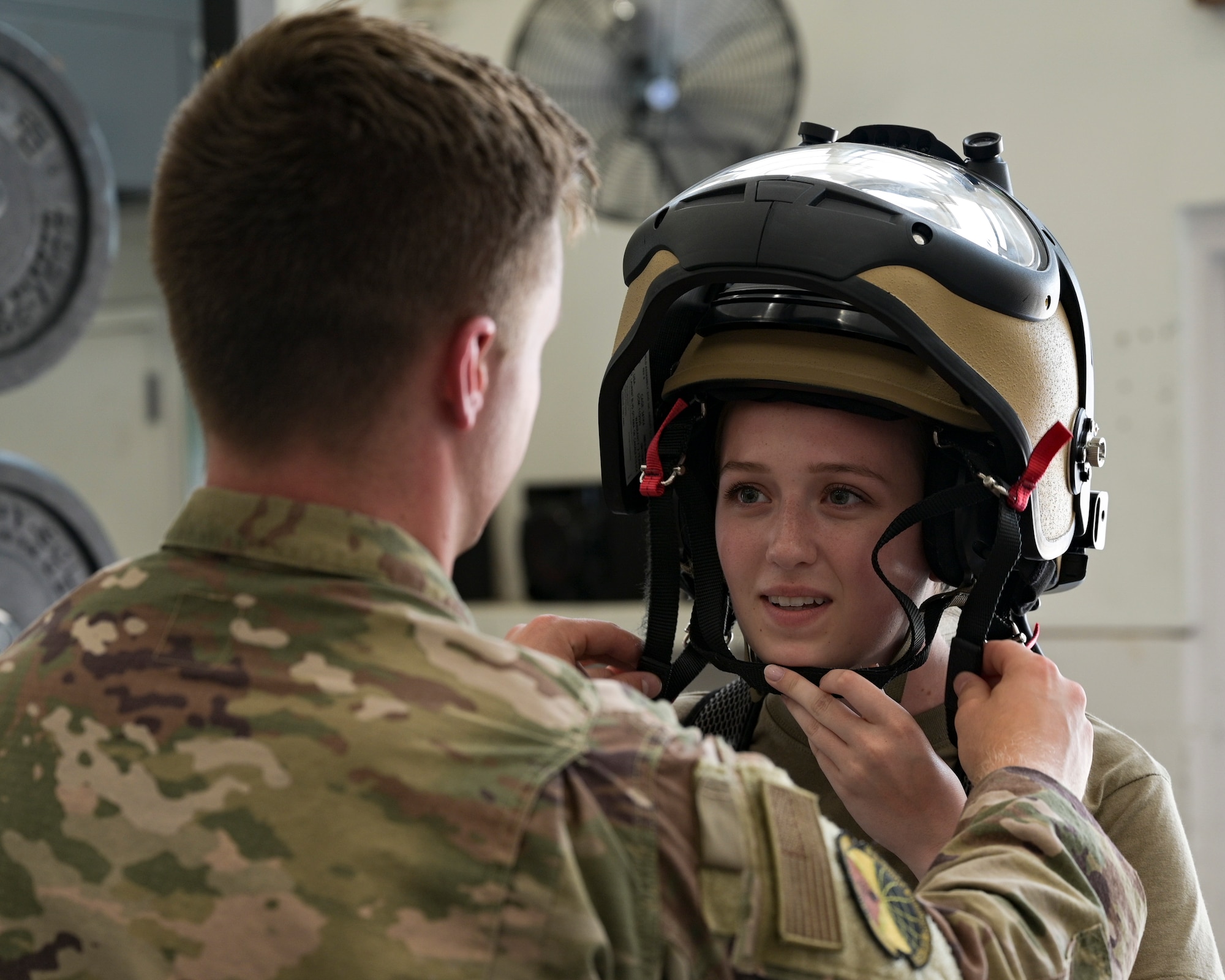 AF ROTC member putting on gear