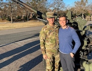 1st Lt. Justin Riordan, at left, poses with his husband in Richmond, Virginia.