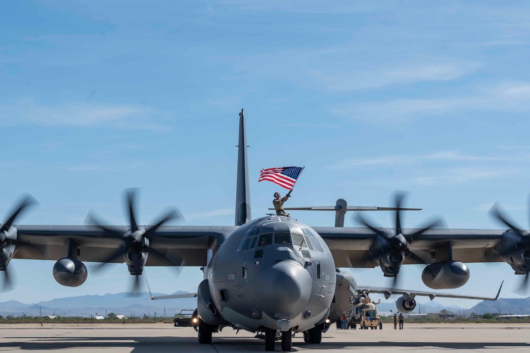 An HC-130J Combat King II, assigned to the 79th Rescue Squadron, taxis down the flight line