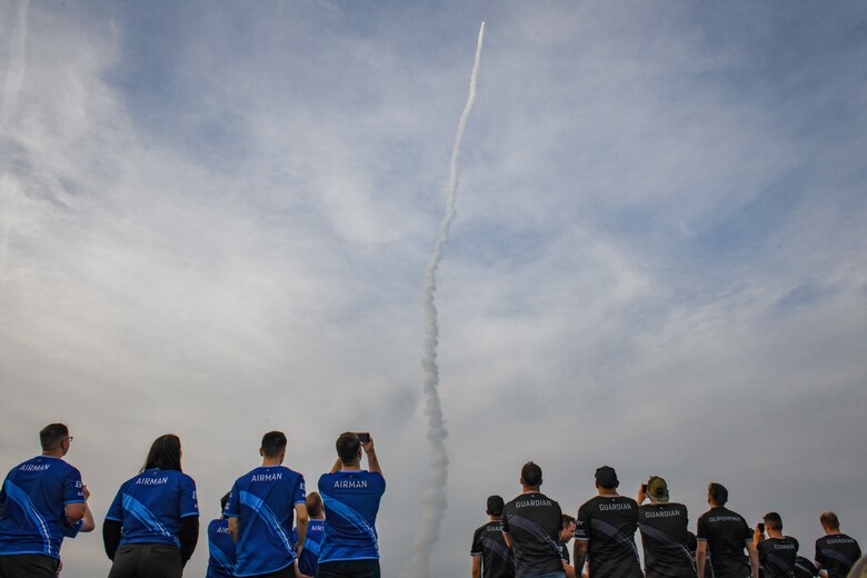 U.S. Air Force and U.S. Space Force gaming teams watch the launch of the United Launch Alliance Atlas V Starliner Orbital Flight Test-2 at Cape Canaveral Space Force Station, Florida, May 19, 2022. The OFT-2 mission was the first launch supported by the Range Application Deployment system after the system gained operational acceptance. (U.S. Space Force photo by Senior Airman Thomas Sjoberg)