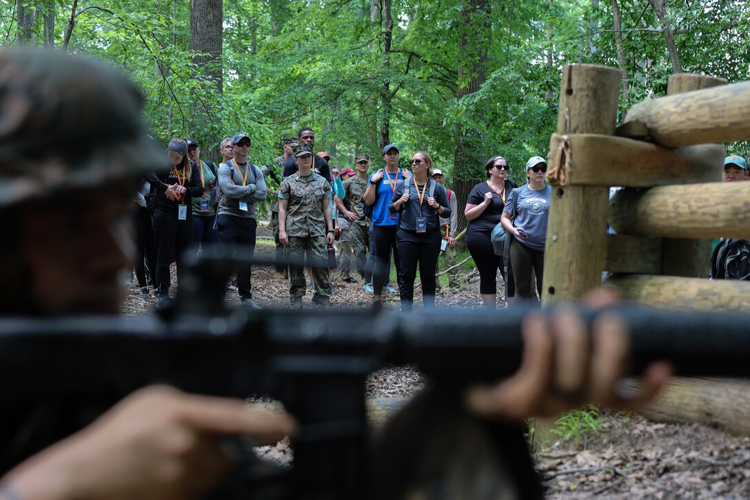 Educators from across the Nation watch Marines execute the Quigley obstacle course at the Officer Candidate School aboard Marine Corps Base Quantico, Va., June 8, 2022. The Educators’ Workshop is designed to inform  college educators how Marines are recruited, trained, and developed into leaders. (U.S. Marine Corps photo by Lance Cpl. Hannah Hollerud)