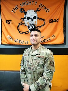 U.S. Air Force Staff Sgt. Antonio Lomeli II, an aircraft maintainer deployed to the 8th Expeditionary Air Mobility Squadron, poses for a photo at Al Udeid Air Base, Qatar, May 20, 2022. Lomeli is deployed to the 8th EAMS from Joint Base Charleston, South Carolina. The 8th EAMS is a 521st Air Mobility Operations Wing unit that provides en route aircraft maintenance, aerial port operations, and command and control for Air Mobility Command missions transiting through AUAB and the U.S. Central Command theater. (Courtesy Photo)