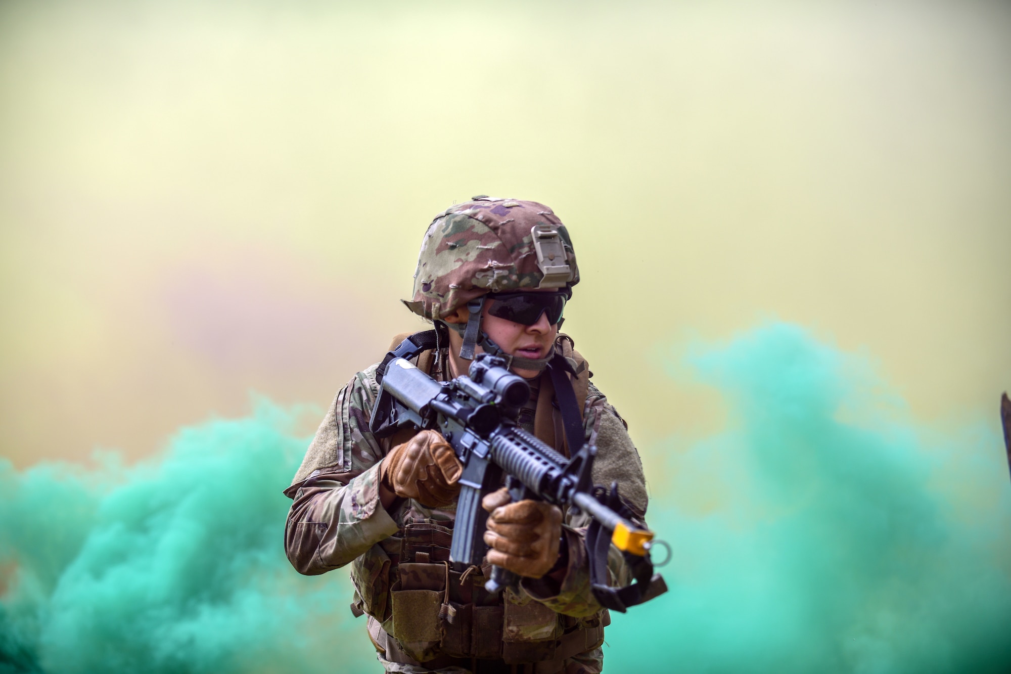 Senior Airman Melanie Gonzales, a defender with the 403rd Security Forces Squadron stationed at Keesler Air Force Base, Miss., assaults an enemy position