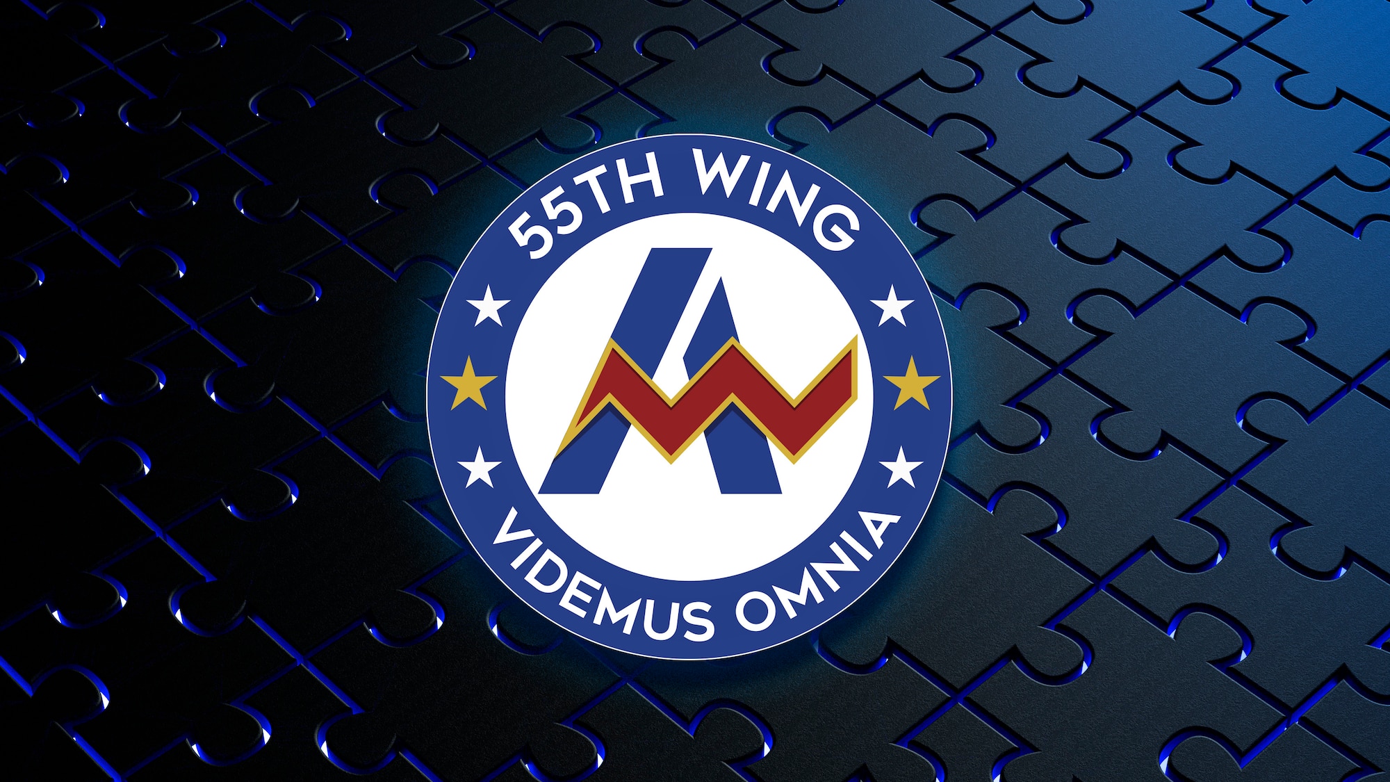 Blue circle with 55th Wing and motto with white center and an A.