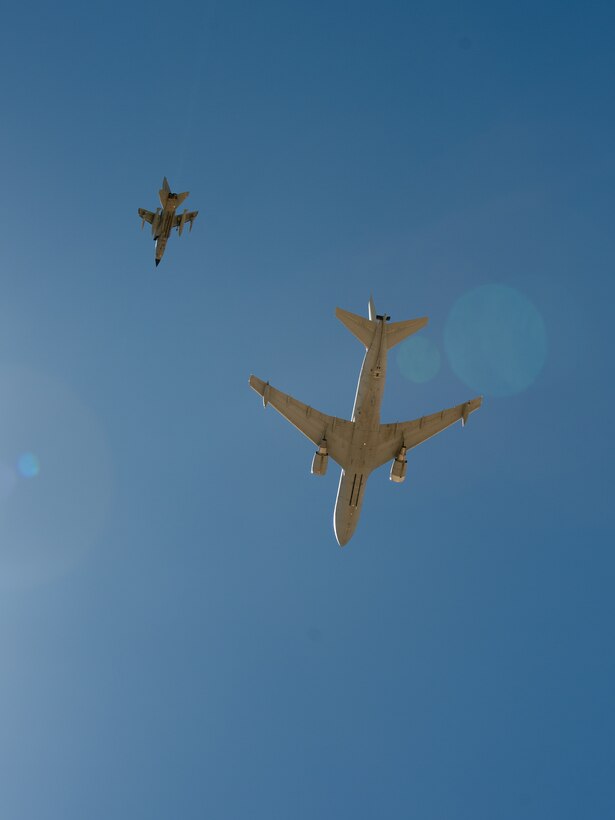 An Italian Air Force PA-200 Tornado and KC-767 flies over Edwards Air Force Base, California, May 9. Members of the Italian Air Force partnered with their Edwards AFB counterparts to conduct test sorties to gather data on weapon pairing. (Air Force photo by Josh McClanahan)