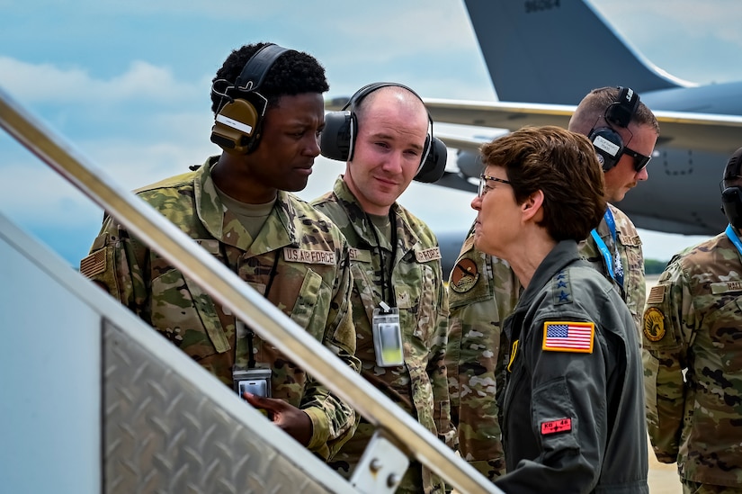 U.S. Air Force Gen. Jacqueline Van Ovost, U.S. Transportation Command commander, visits with Airmen from the 305th Air Mobility Wing at Joint Base McGuire-Dix-Lakehurst, New Jersey, June 3, 2022. Van Ovost toured the Air Force’s newest refueling tanker, the KC-46A Pegasus and met with warfighters who project its military power globally.
