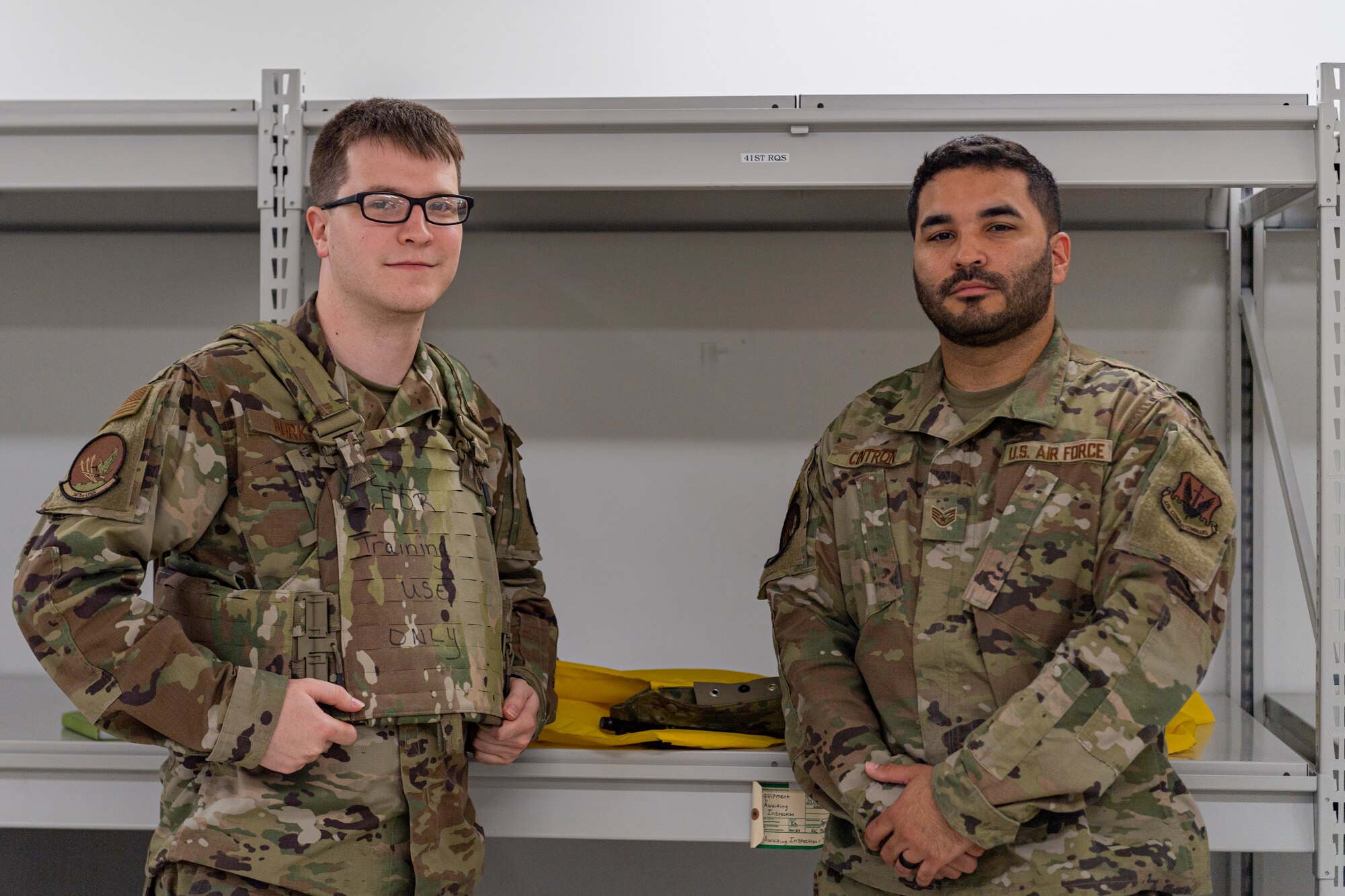 Photo of two Airmen posing