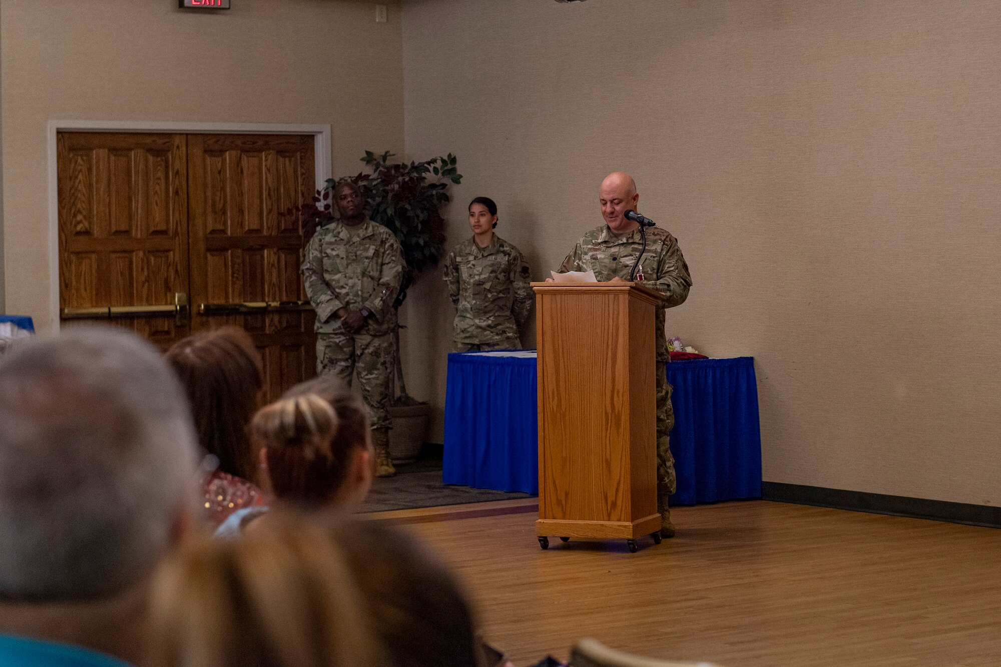 Photo of an Airman delivering a speech