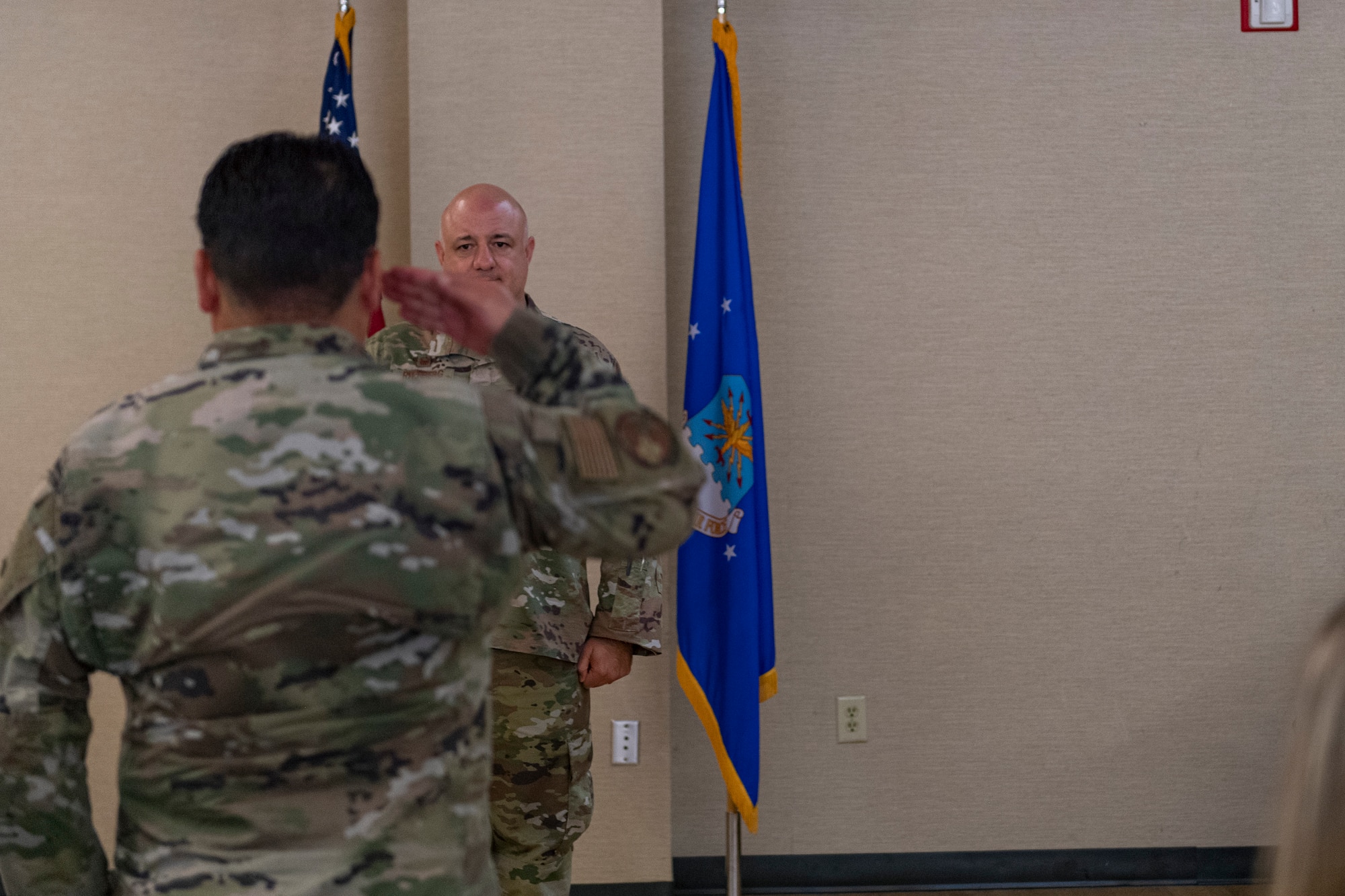 Photo of an Airman rendering a final salute