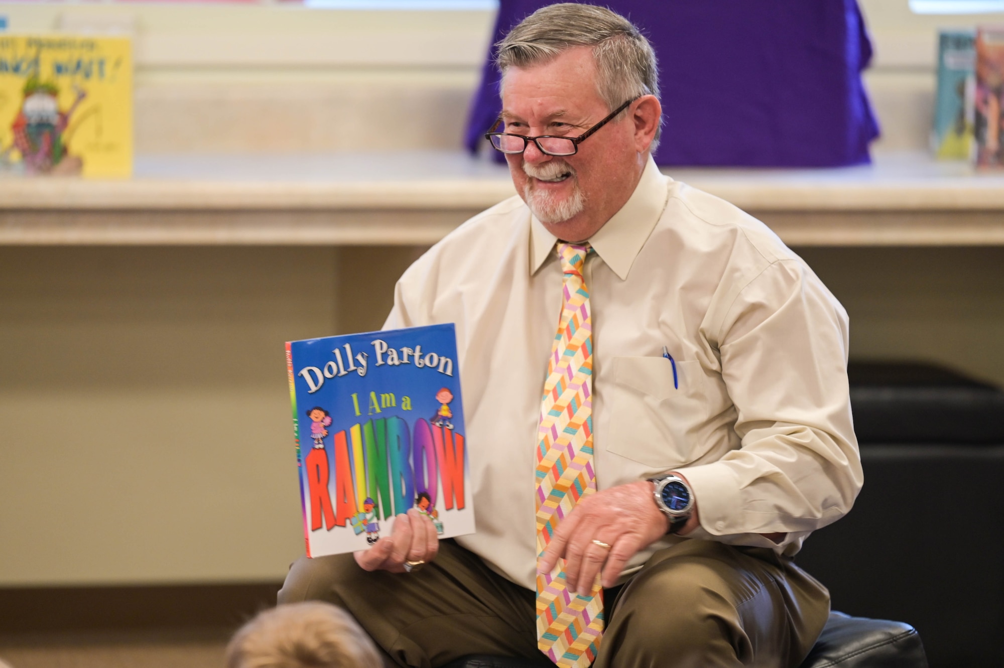 Chairman Bill Slaughter, Lowndes County Commission, read to children from the Child Development Center at Moody Air Force Base, Georgia, June 7, 2022. Chairman Slaughter was invited to Moody AFB to read books to children as a community leader and member of the Valdosta Rotary Club. (U.S. Air Force photo by Senior Airman Rebeckah Medeiros)