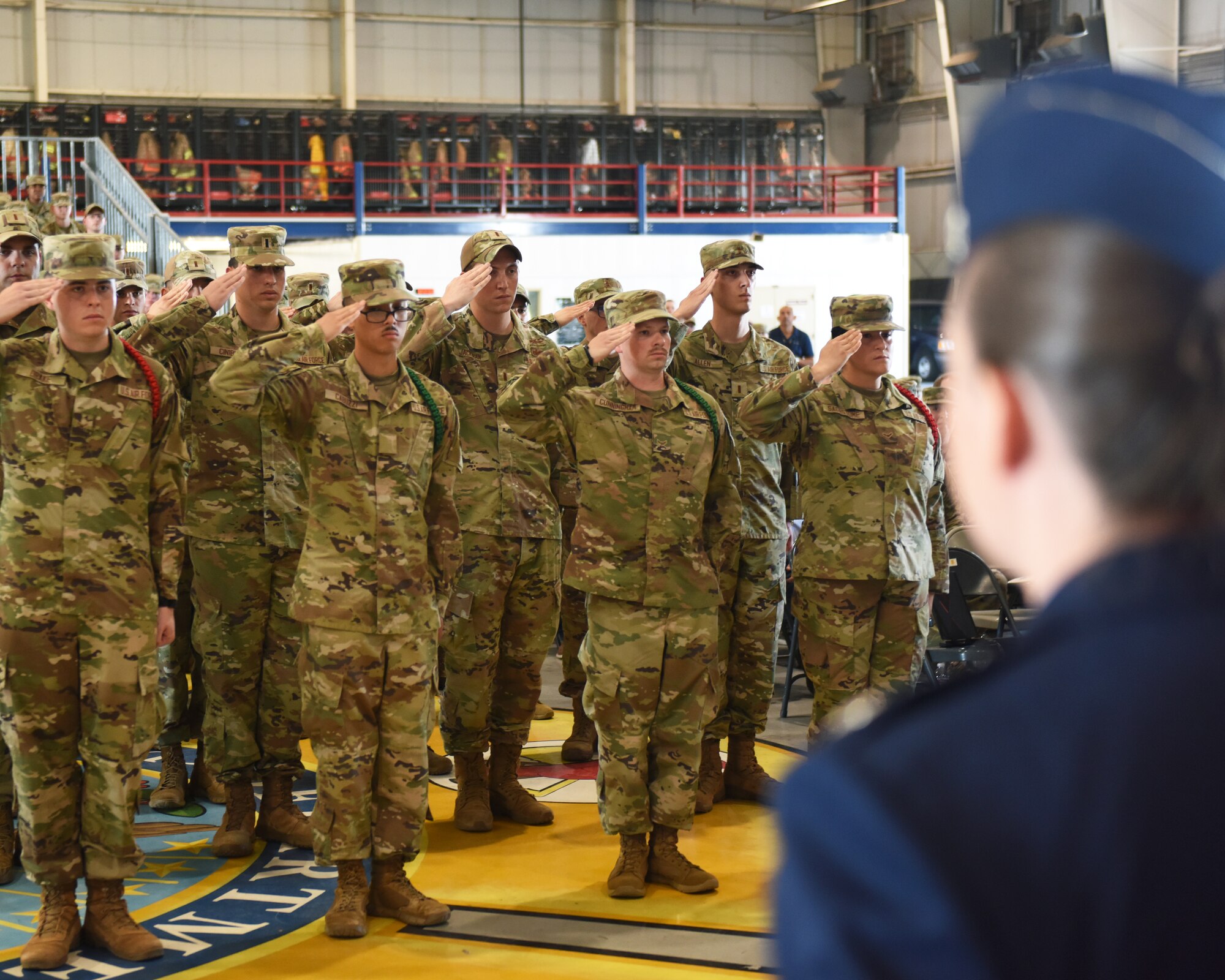 Members of the 315th Training Squadron salute U.S. Air Force Lt. Col. Liane Zivitski, 315th TRS incoming commander, during the 315th TRS change of command ceremony at Goodfellow Air Force Base, Texas, June 10, 2022. Zivitski previously served as the chief, operations branch, intelligence, surveillance, and reconnaissance operations and integrations division, joint staff J-3, at the Pentagon, Arlington, Virginia. (U.S. Air Force photo by Airman 1st Class Zachary Heimbuch)