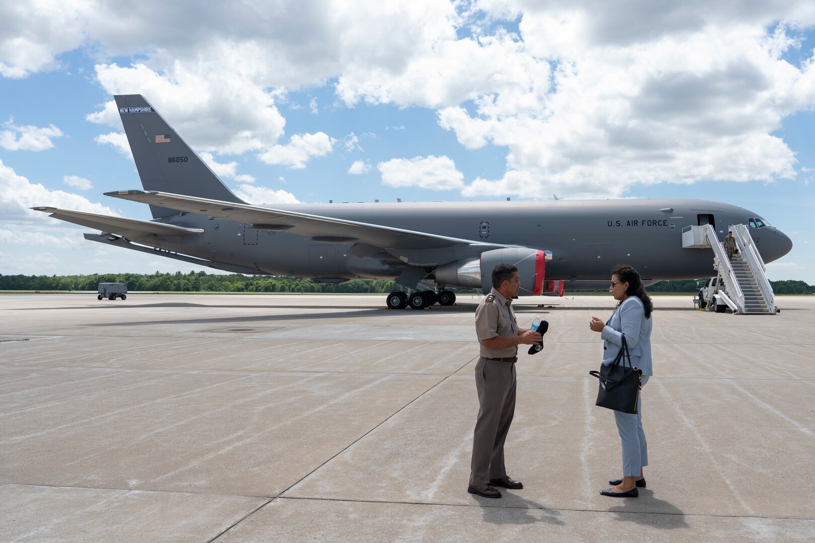 Cabo Verde Minister of Defense Janine Lélis, and NH Adjutant Gen. David Mikolaities exit a KC-46A Pegasus after receiving a tour of the aircraft June 8, 2022, at Pease Air National Guard Base.