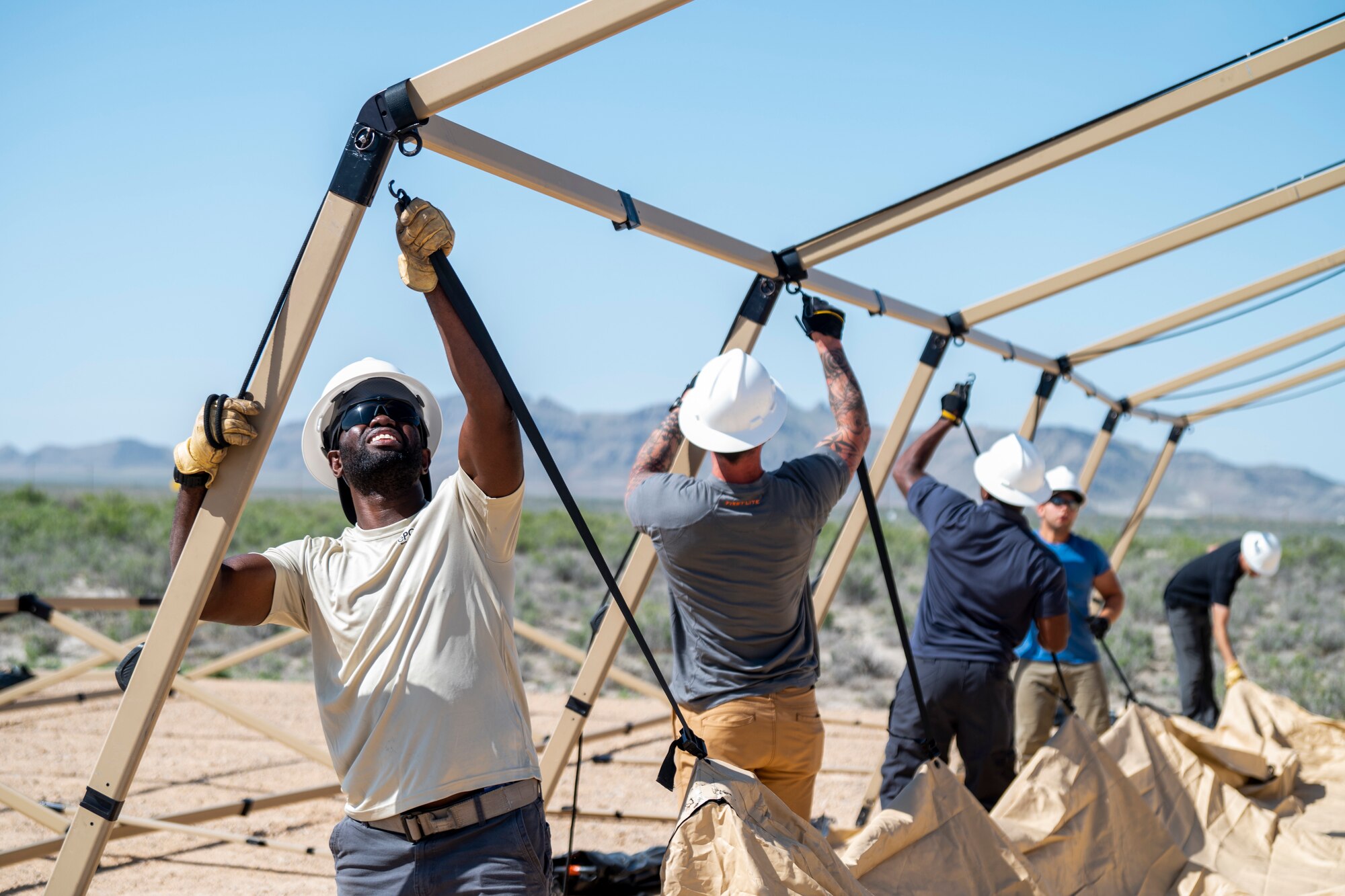 Airmen with the 24th Special Operations Wing deployment cell set up a TM-75 tent