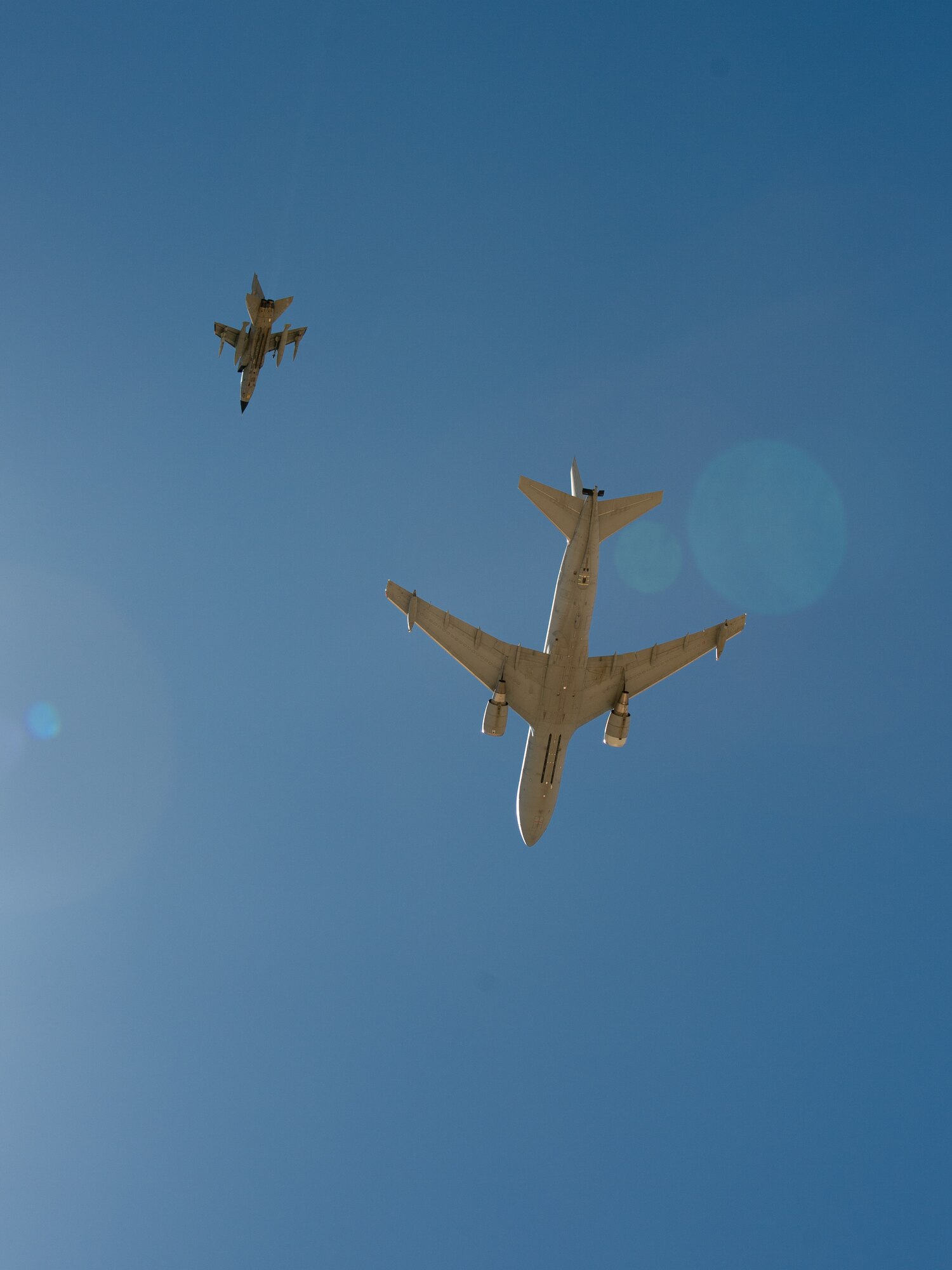 An Italian Air Force PA-200 Tornado and KC-767 flies over Edwards Air Force Base, California, May 9. Members of the Italian Air Force partnered with their Edwards AFB counterparts to conduct test sorties to gather data on weapon pairing. (Air Force photo by Josh McClanahan)