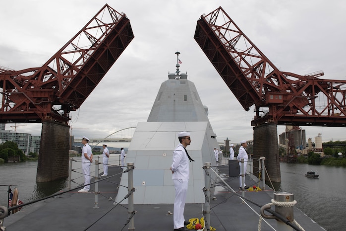 The Zumwalt-class destroyer USS Michael Monsoor (DDG 1001), passes beneath the Broadway Bridge as the ship transits to Portland, Oregon for Portland Fleet Week 2022.