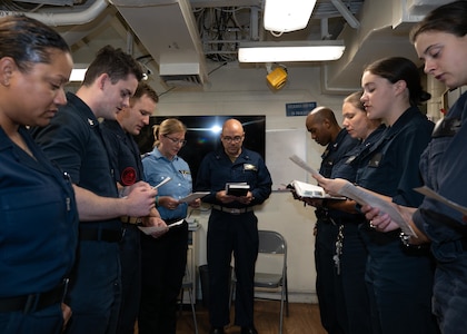 Sailors aboard the Arleigh Burke-class guided-missile destroyer USS Porter (DDG 78), attend a Liturgical Service led by German Navy Chaplain Dr. Katja Bruns, June 6, 2022, during BALTOPS22.