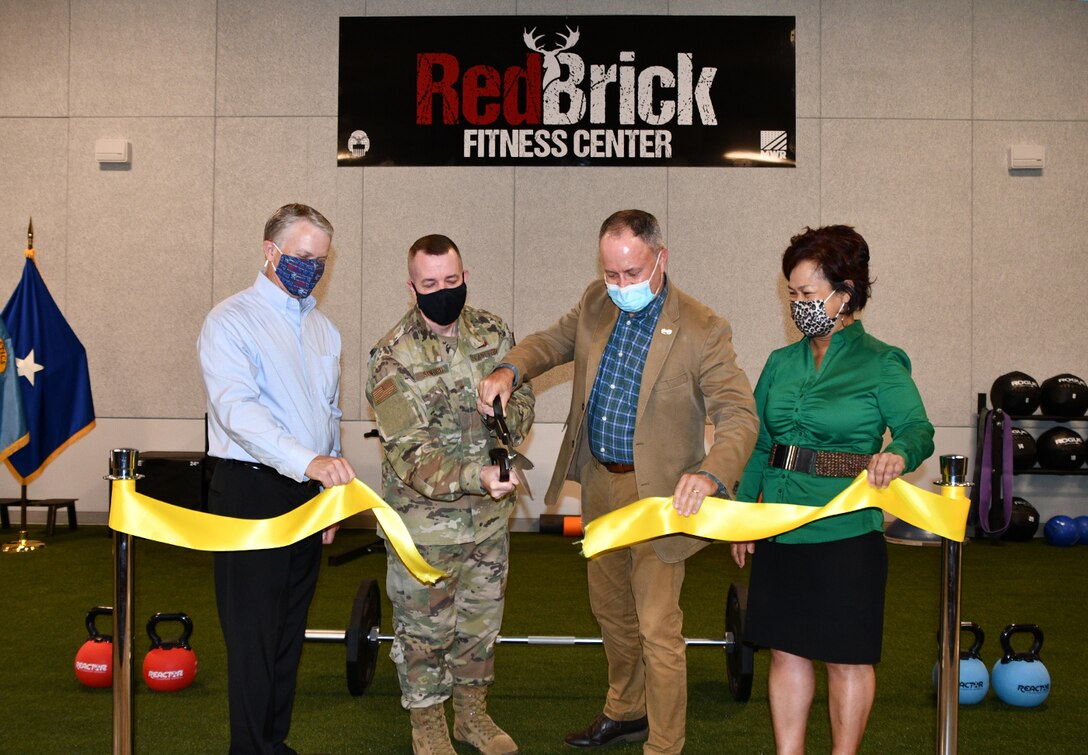 DSCR cuts ribbon for Red Brick Fitness Center during grand opening