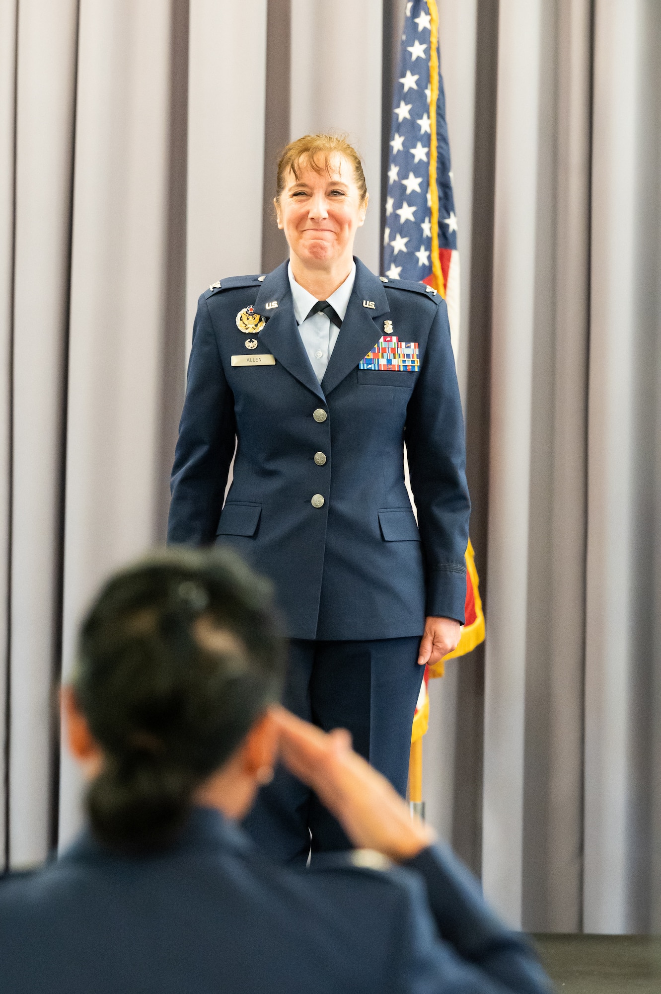 Col. Tracy Allen, outgoing 436th Medical Group commander, receives a final salute from her unit during the 436th MDG Change of Command ceremony at Dover Air Force Base, Delaware, June 9, 2022. During the ceremony Allen relinquished command of the 436th MDG to Col. Peggy Dickson. (U.S. Air Force photo by Mauricio Campino)