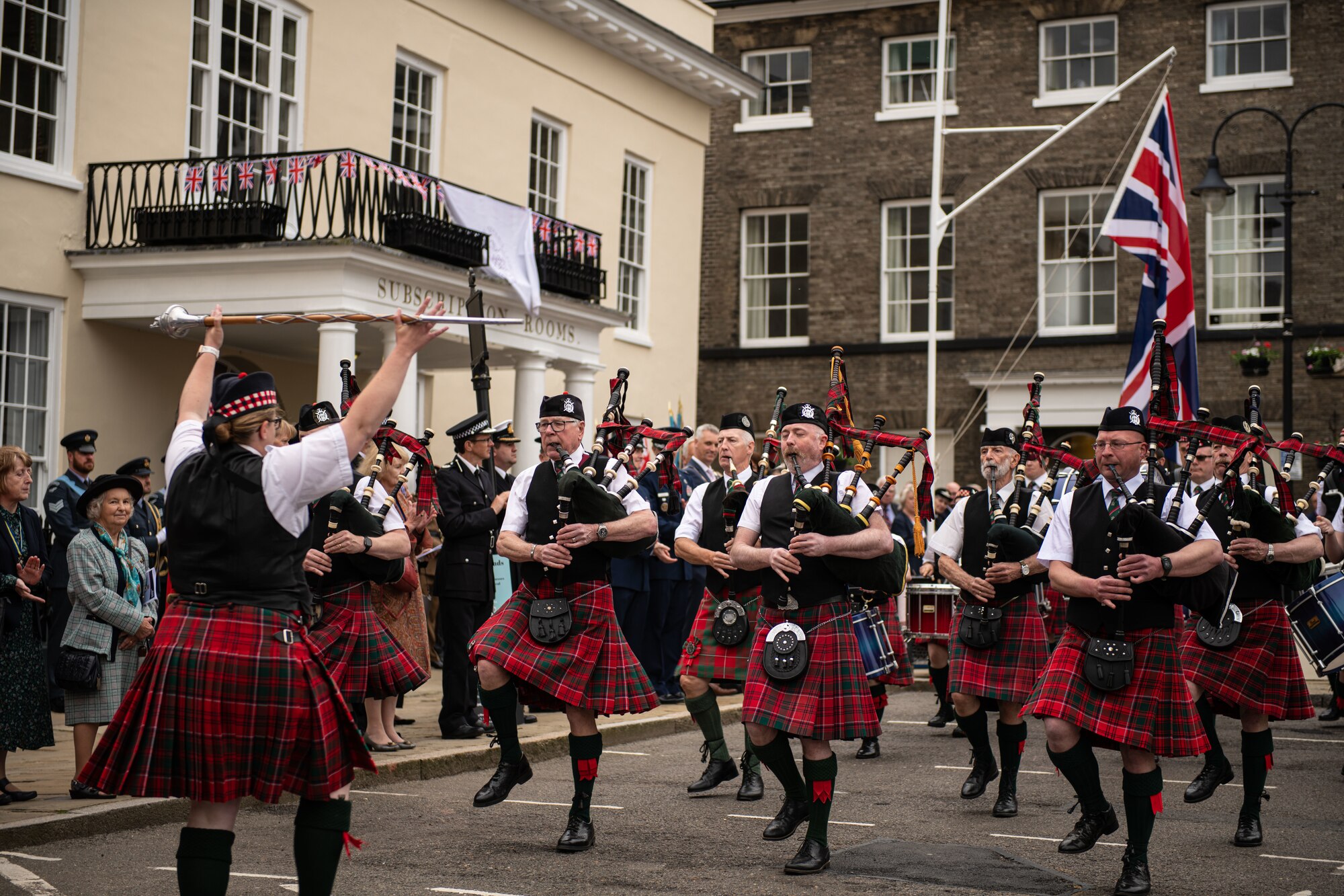 The Glen Morriston Pipe Band performs on Angel Hill.