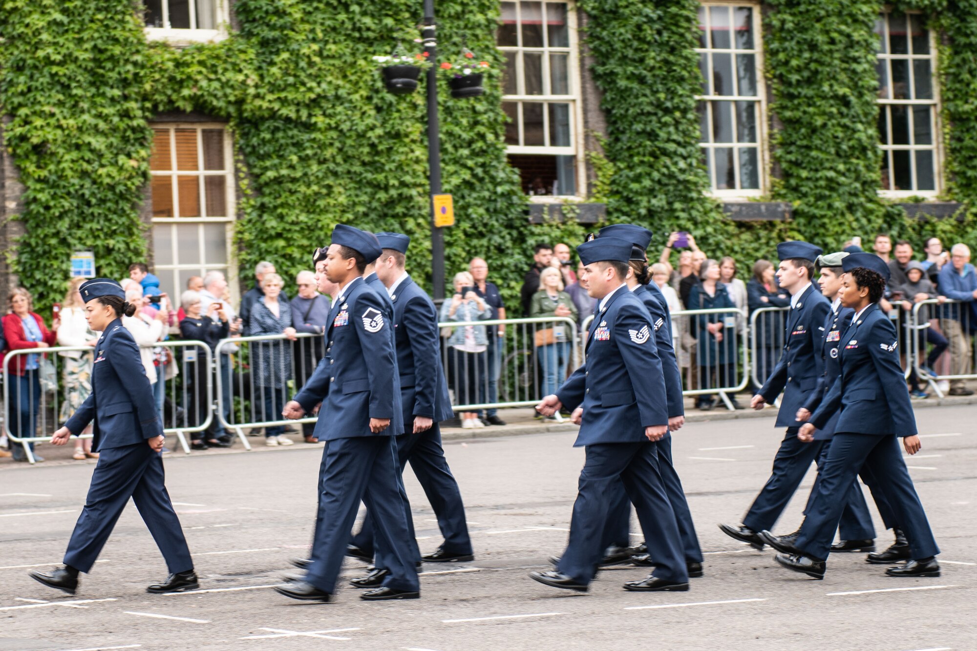 Members from the 100th Air Refueling Wing participate alongside the community during the West Suffolk-Parade and Sunset Ceremony.