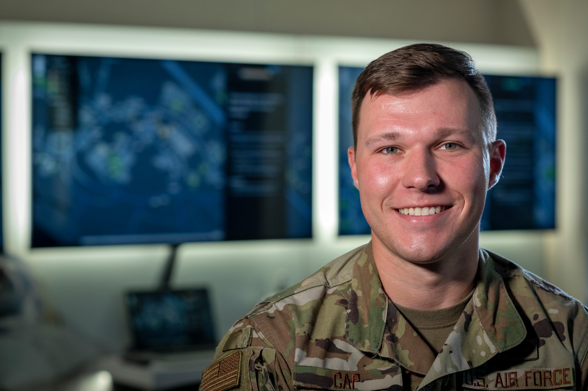 U.S. Air Force 2nd Lt. Nicholas Cap, Air Force Civil Engineer Center Natural Disaster Recovery Project Management Office innovation element co-lead, poses for a photo March 8 2022, at Tyndall Air Force Base, Fla.