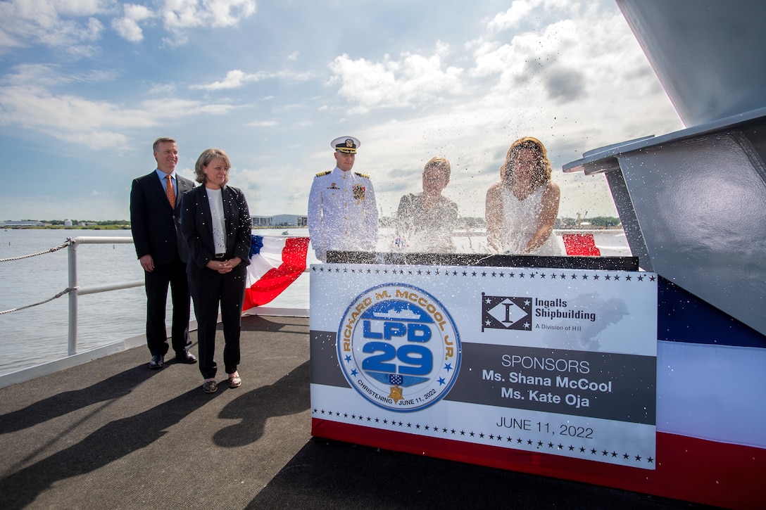 Ship's Sponsors Shana McCool and Kate Oja christened Richard M. McCool Jr. (LPD 29), the U.S. Navy's 13th San Antonio-class amphibious transport dock at HII's Ingalls Shipbuilding division. LPD 29 is named for McCool and Oja's grandfather, Capt. Richard M. McCool Jr., a Medal of Honor recipient. (Courtesy photo)