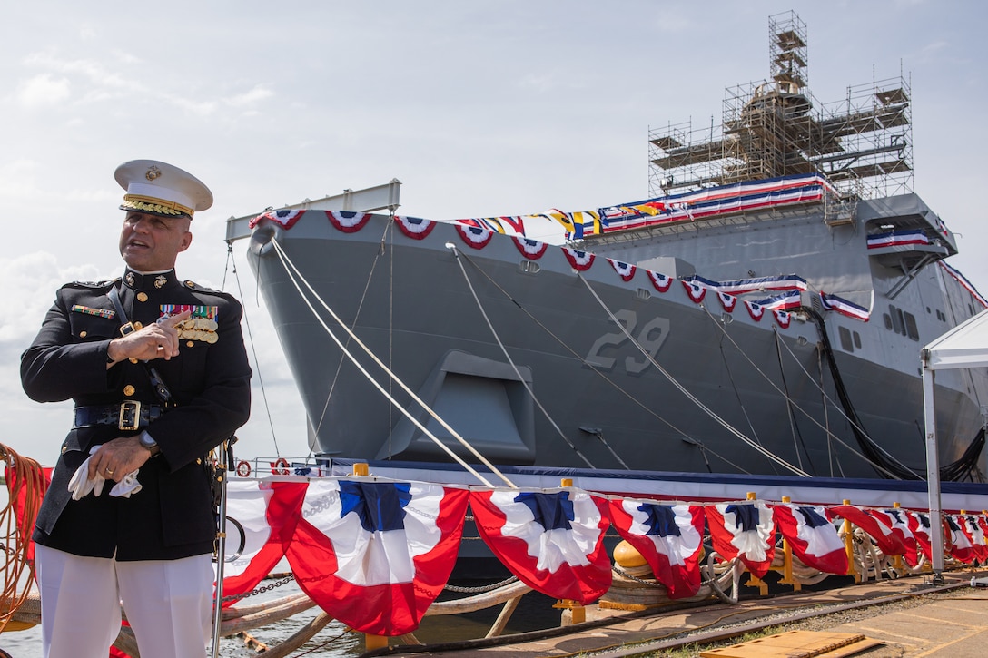 Lt. Gen. David G. Bellon, Commander of Marine Forces Reserve and Marine Forces South, addresses guests at the christening ceremony of the USS Richard M. McCool Jr. during a visit to Pascagoula, Miss., June 11, 2022. The USS McCool will be an important piece in the Marine Corps’ and Navy’s ongoing efforts to increase integration and continue to protect vital maritime and national security interests. (U.S. Marine Corps photo by LCpl. Trystan T. Taft)