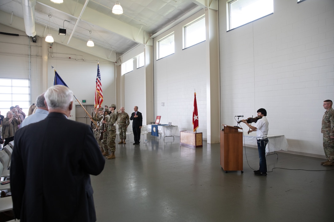 Kentucky National Guard veteran Sgt. John Burlew speaks to friends and family that attend an awards ceremony at the Owensboro Armory in Owensboro, Ky. on June 10, 2022. Burlew was awarded the Bronze Star Medal with Valor for actions in Afghanistan in 2002 (U.S. Army photo by Andy Dickson).