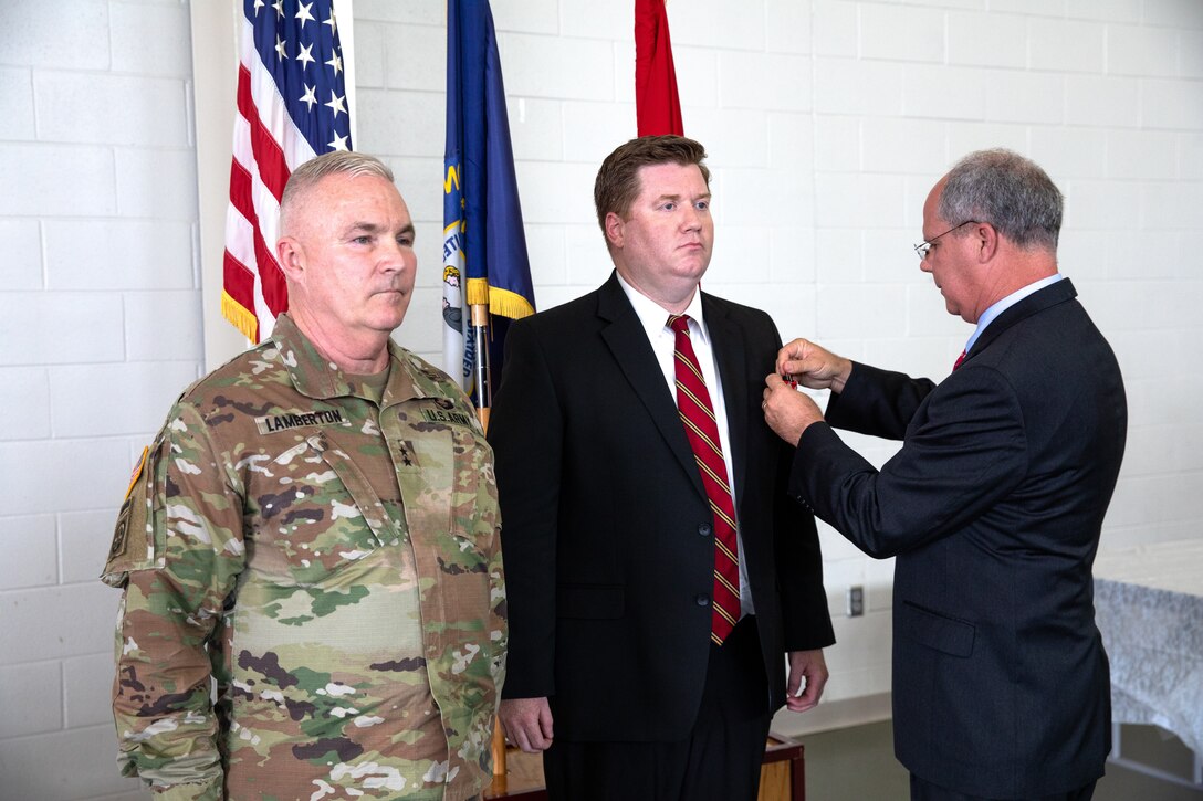 Kentucky National Guard veteran Sgt. John Burlew speaks to friends and family that attend an awards ceremony at the Owensboro Armory in Owensboro, Ky. on June 10, 2022. Burlew was awarded the Bronze Star Medal with Valor for actions in Afghanistan in 2002 (U.S. Army photo by Andy Dickson).