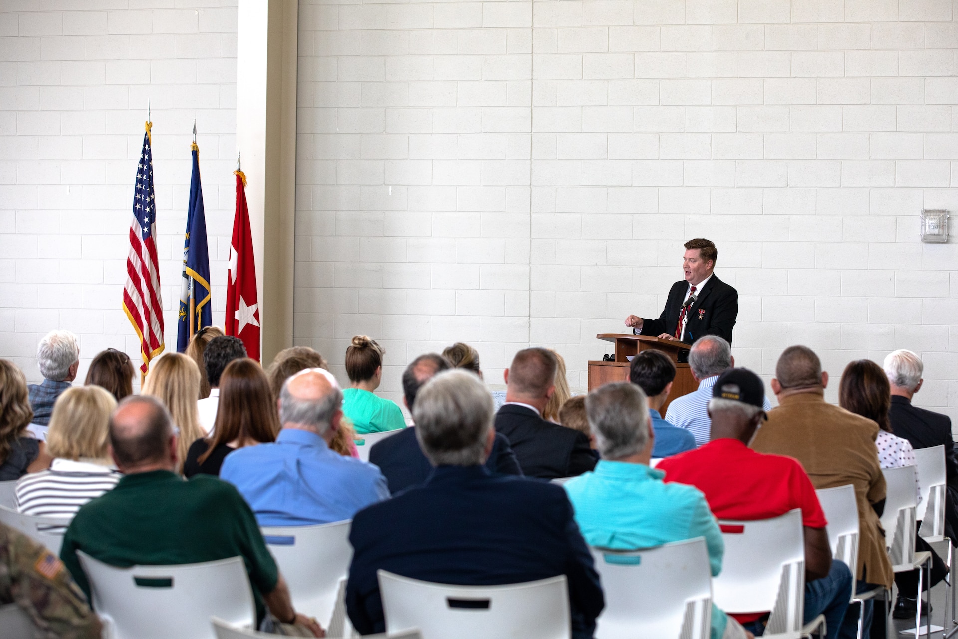 Kentucky National Guard veteran Sgt. John Burlew speaks to friends and family that attend an awards ceremony at the Owensboro Armory in Owensboro, Ky. on June 10, 2022. Burlew was awarded the Bronze Star Medal with Valor for actions in Afghanistan in 2002 (U.S. Army photo by Andy Dickson).